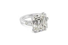Anello di fidanzamento a tre pietre con diamante taglio smeraldo certificato GIA da 12.55 carati
