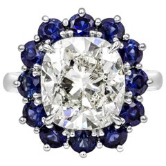 Bague de fiançailles certifiée GIA de 7.04 carats, diamant taille coussin et saphir Halo
