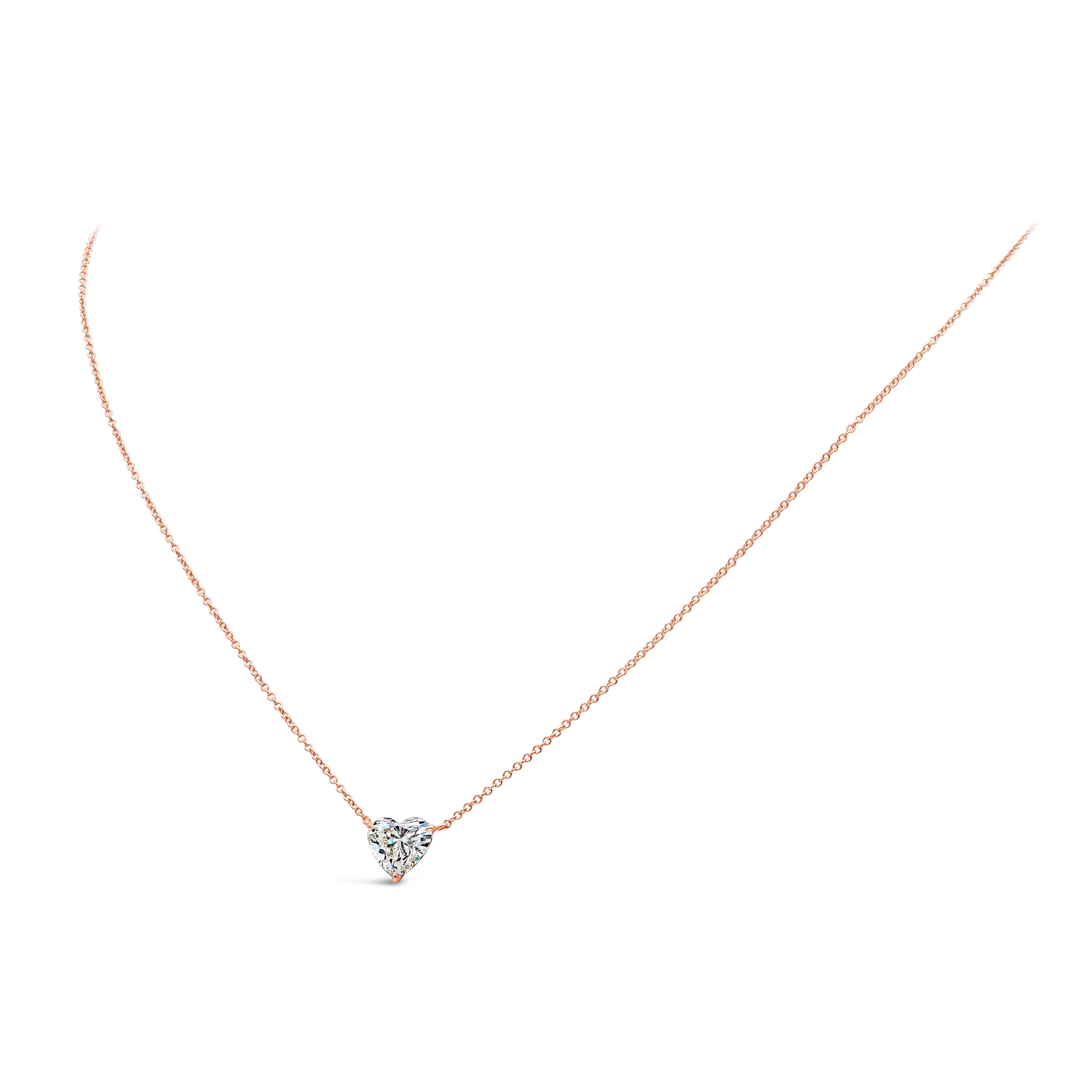 An elegant necklace, showcasing a 1.53 carats heart shape diamond certified by GIA as M color and I1 clarity, set on a three prong setting. Finely made with 18K rose gold, 16-18 inches in length.

Roman Malakov is a custom house, specializing in