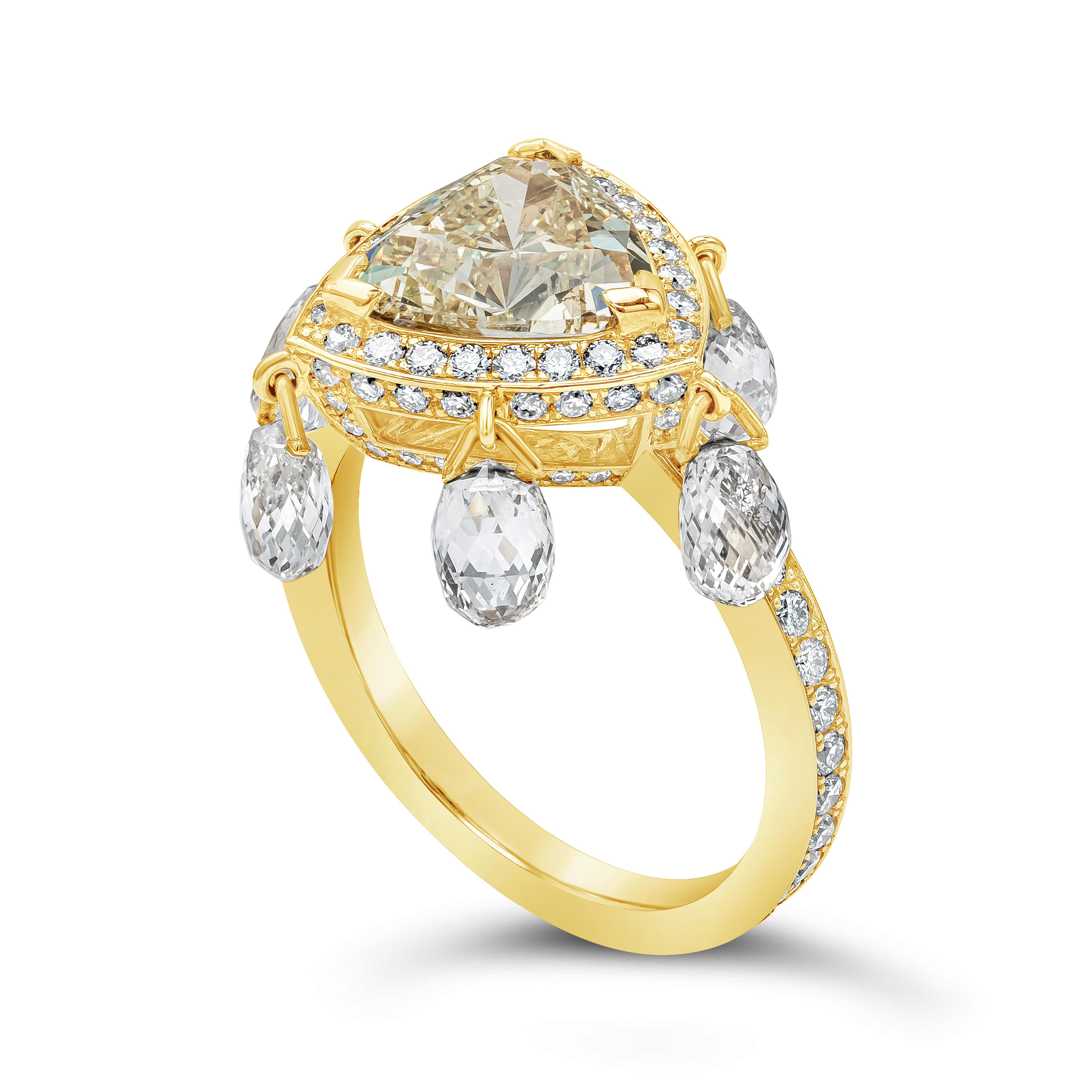A fascinating and exquisite fashion ring features a triangular yellow diamond weighing 2.02 carats, certified by GIA as Fancy Yellow in color and I1 in clarity, Bezel set in a diamonds encrusted halo design. Accented with six briolette diamonds