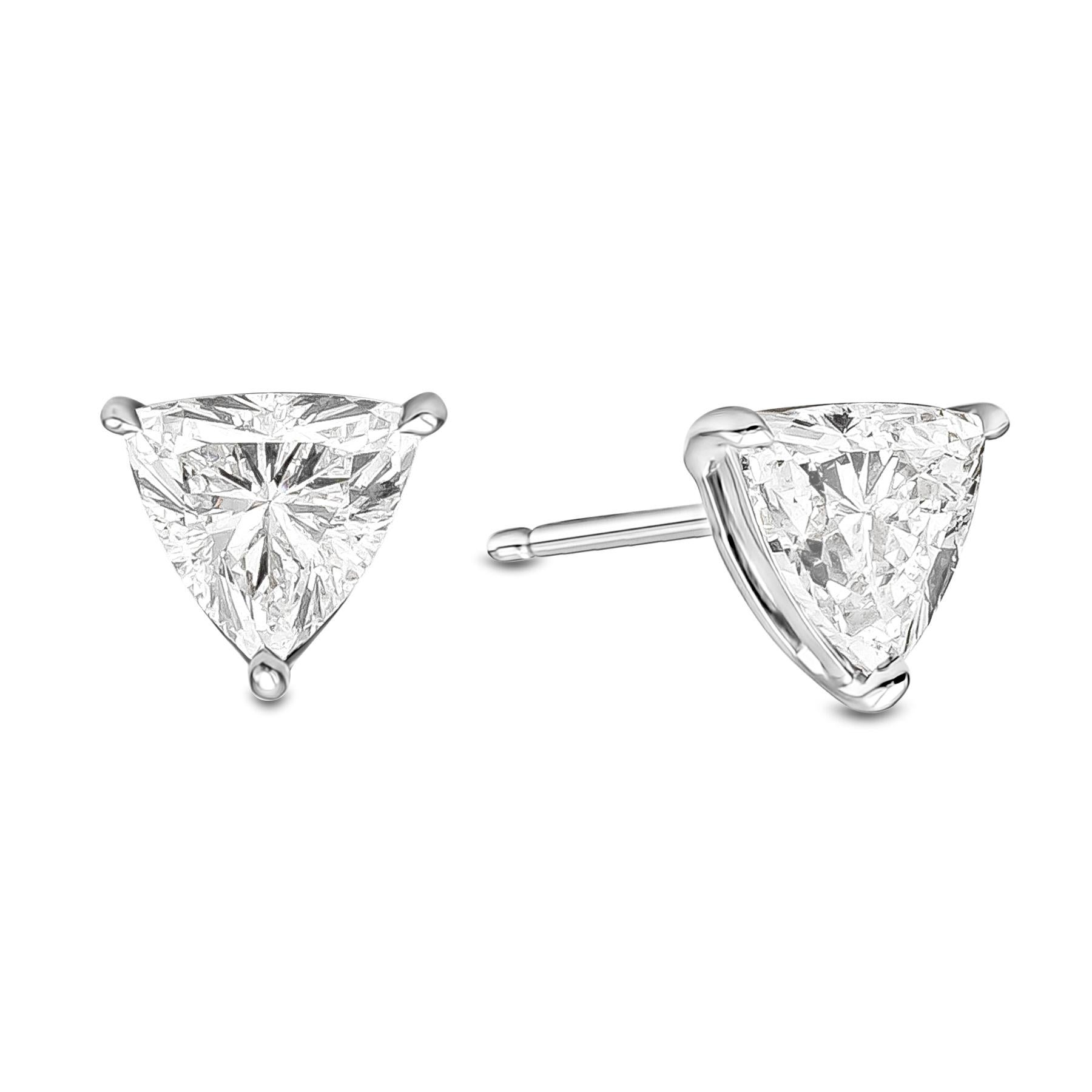 A pair of charming stud earrings, featuring 2.34 carats of trillion cut diamonds certified by GIA as E-F color and SI2 clarity. Perfectly crafted in three prong baskets setting made of 18K white gold.

Roman Malakov is a custom house, specializing