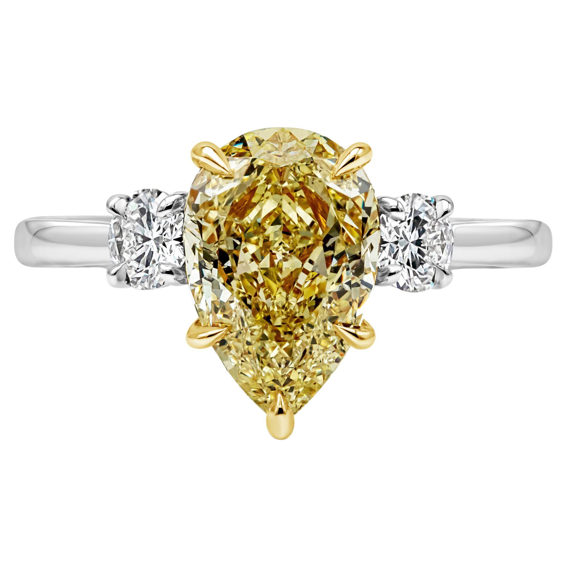 GIA Certified 2.53 Carats Pear Shape Yellow Diamond Three-Stone Engagement Ring