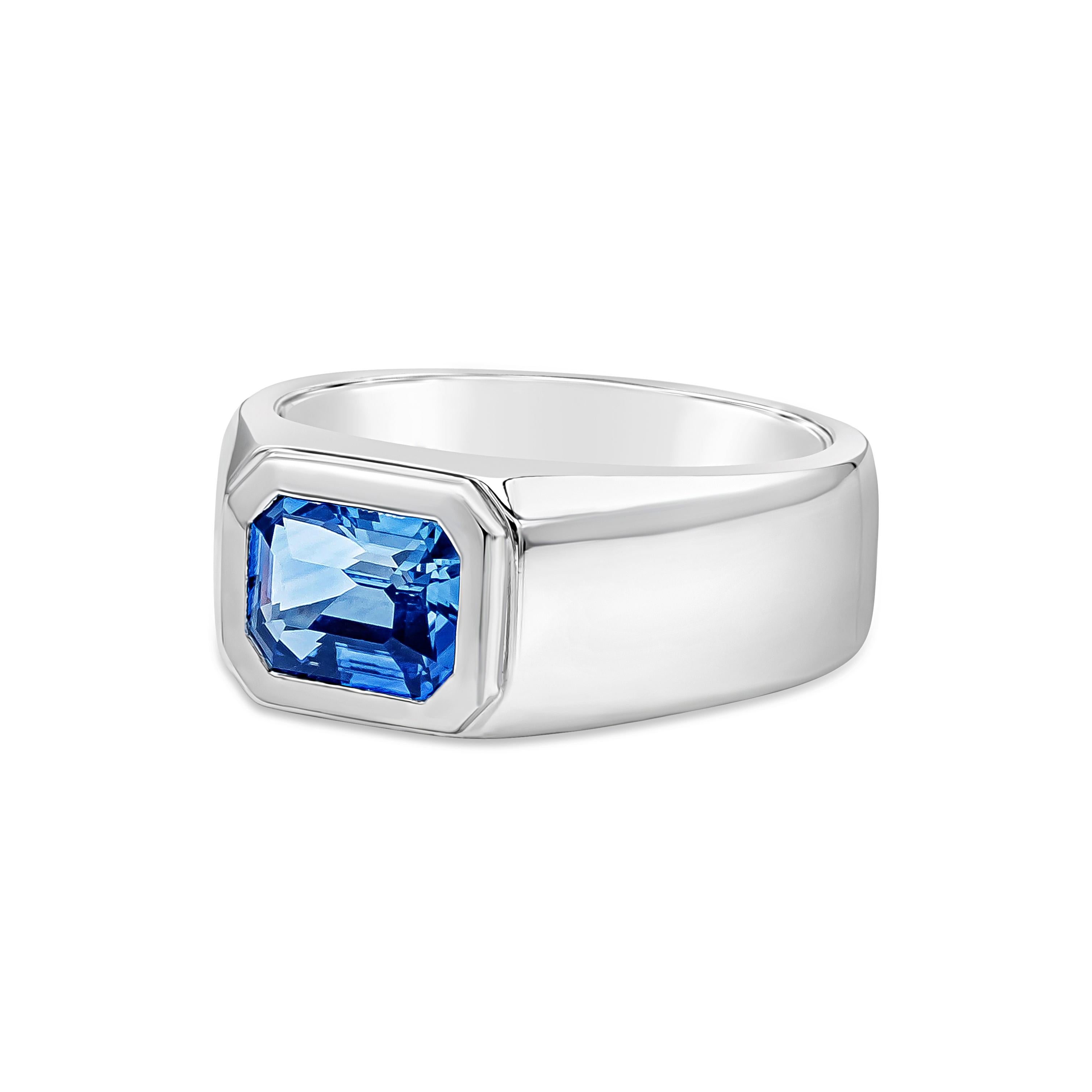 An elegant men's wedding band ring featuring an astonishing GIA Certified 2.98 carat emerald cut blue sapphire, set in a beautiful wide platinum band. Size 10

Roman Malakov is a custom house, specializing in creating anything you can imagine. If