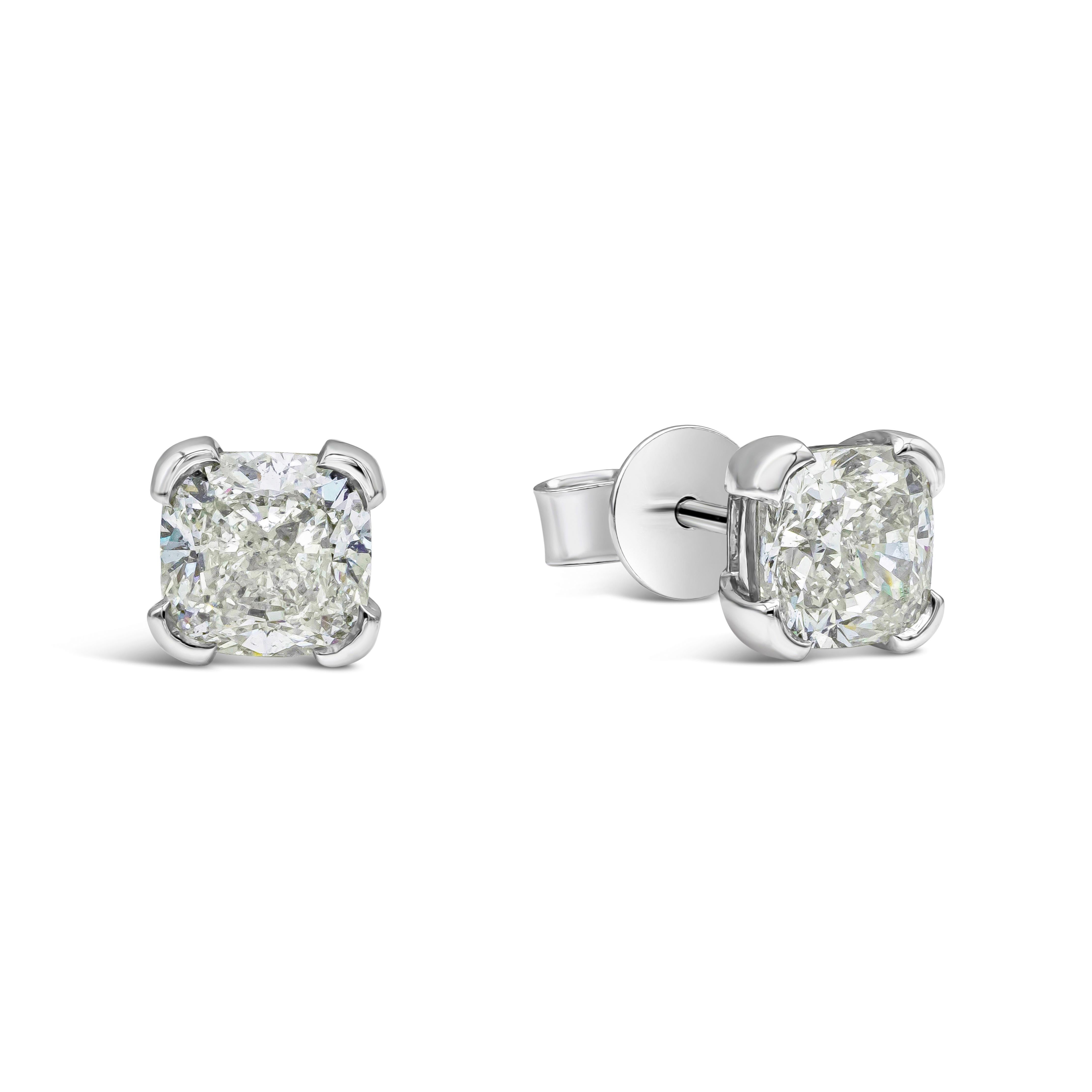 Classic pair of stud earrings showcasing two GIA Certified cushion cut diamonds, each weighing 1.51 carats, I Color and SI2 in Clarity. Set in a simple four prong, Made with Platinum./

Roman Malakov is a custom house, specializing in creating