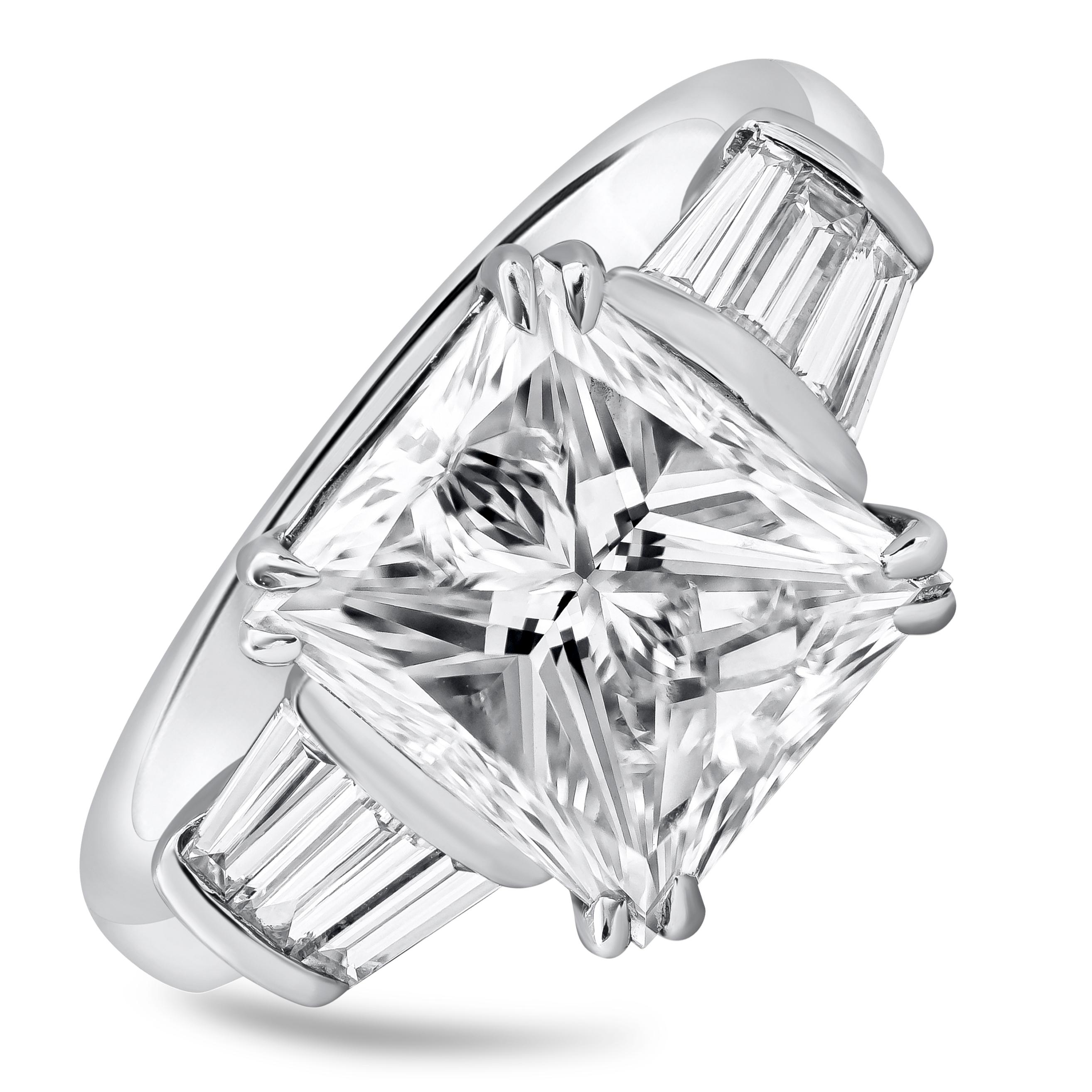 A unique yet classic style engagement ring featuring a 5.03 carat princess cut diamond that GIA Certified as G color VS2 in clarity. Three perfectly matched tapered baguette diamonds invisibly set on each side. Baguette diamonds weigh 1.01 carats