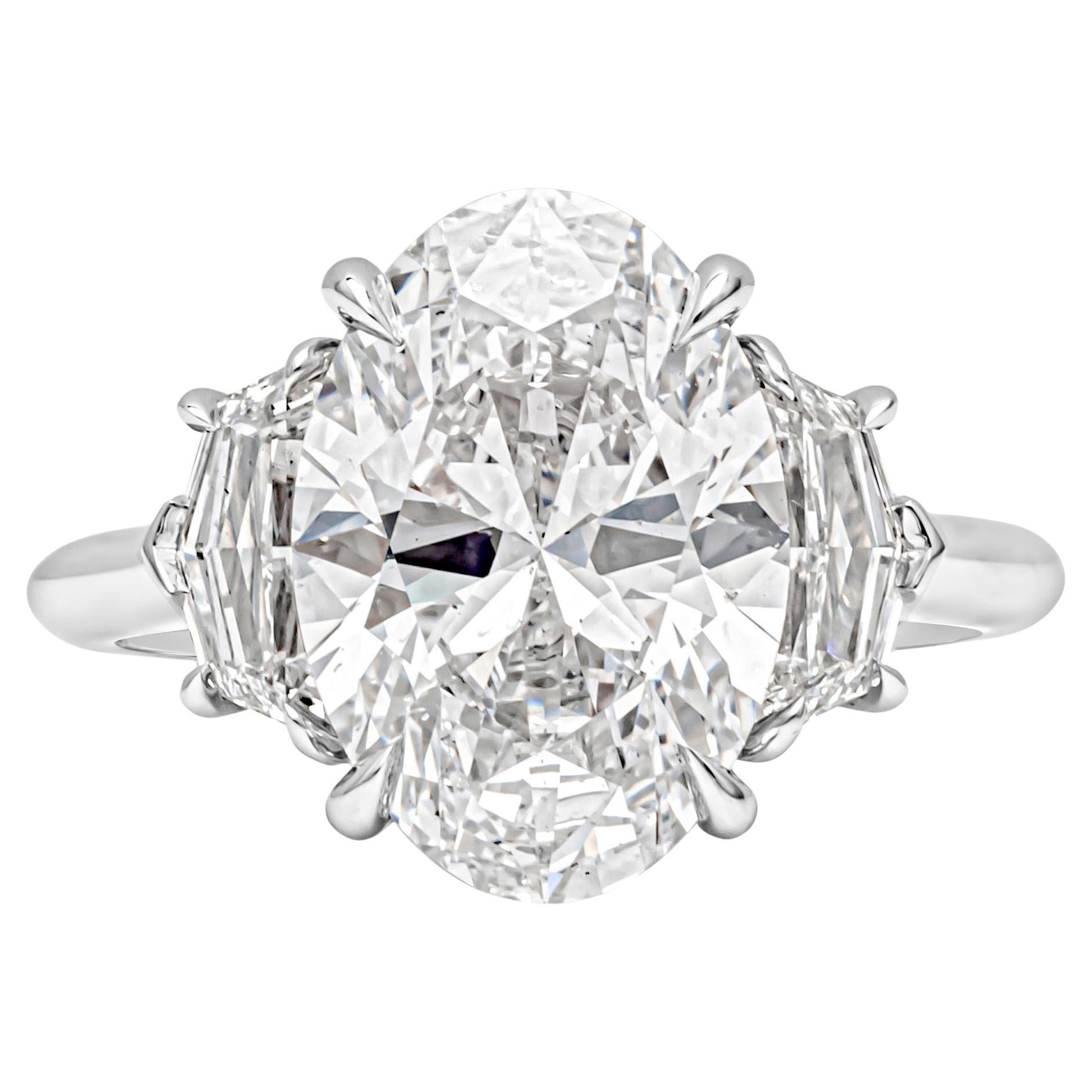 Roman Malakov GIA Certified 5.11 Carats Oval Cut Diamond Three-Stone Ring For Sale