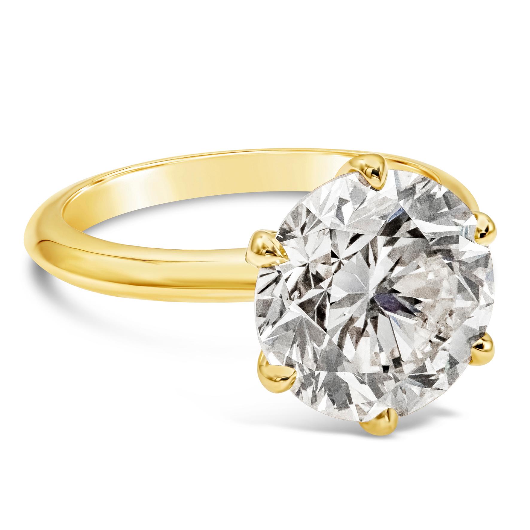 A classic engagement ring style showcasing a GIA Certified 5.48 carat round brilliant diamond, N Color and VS2 in Clarity, Excellent polish and Excellent Symmetry. Mounted in a six-prong setting, Made with 18K Yellow Gold, Size 6.25 US

Style