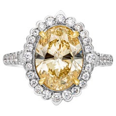 GIA Certified 3.39 Carats Oval Cut Fancy Intense Yellow Diamond Halo Engagement 