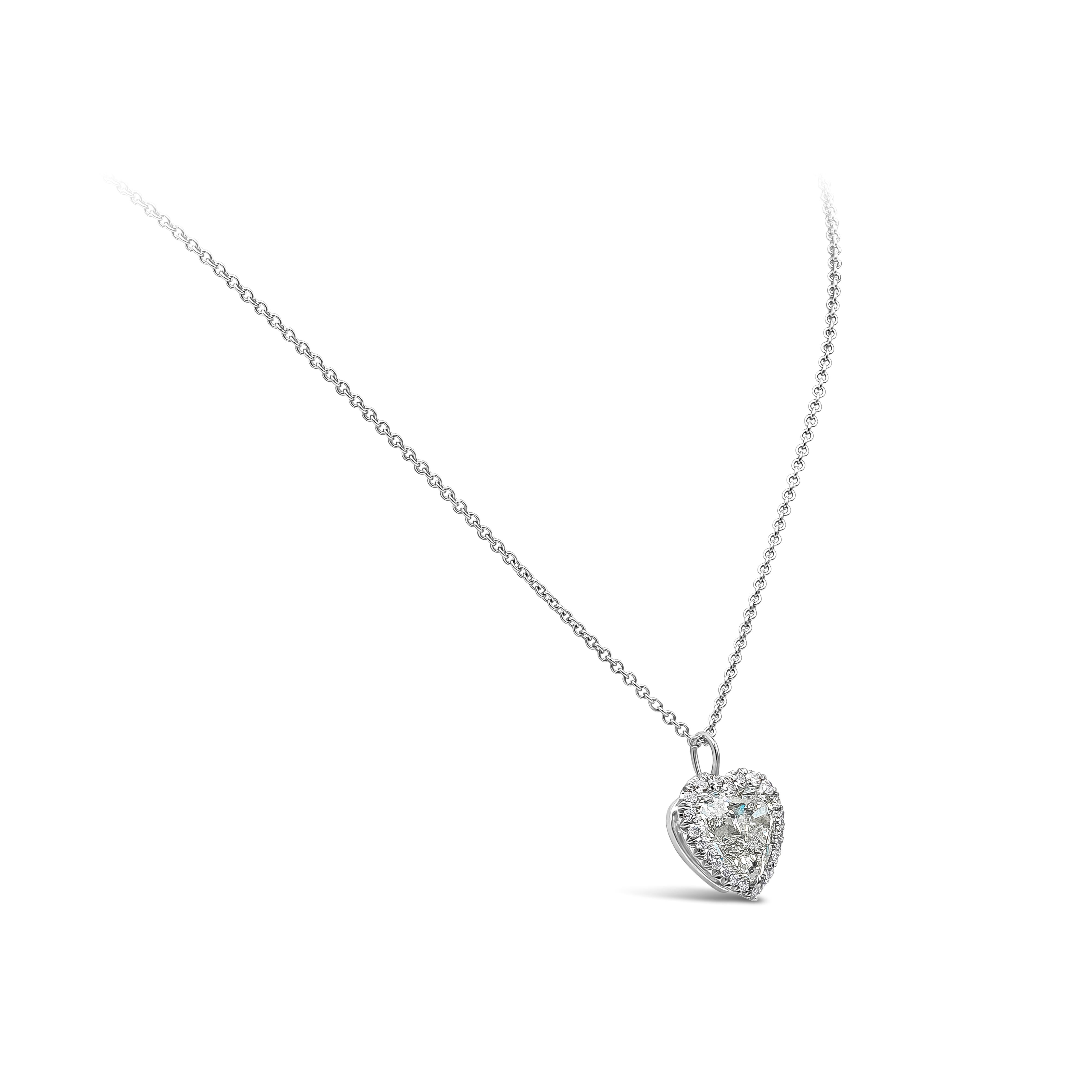 A unique and versatile halo pendant necklace showcasing a 5.01 carat heart shape diamond certified by GIA as H color, VS2 clarity. Surrounding the center diamond is a row of 27 pieces of round brilliant diamonds weighing 0.45 carats total, GH color,