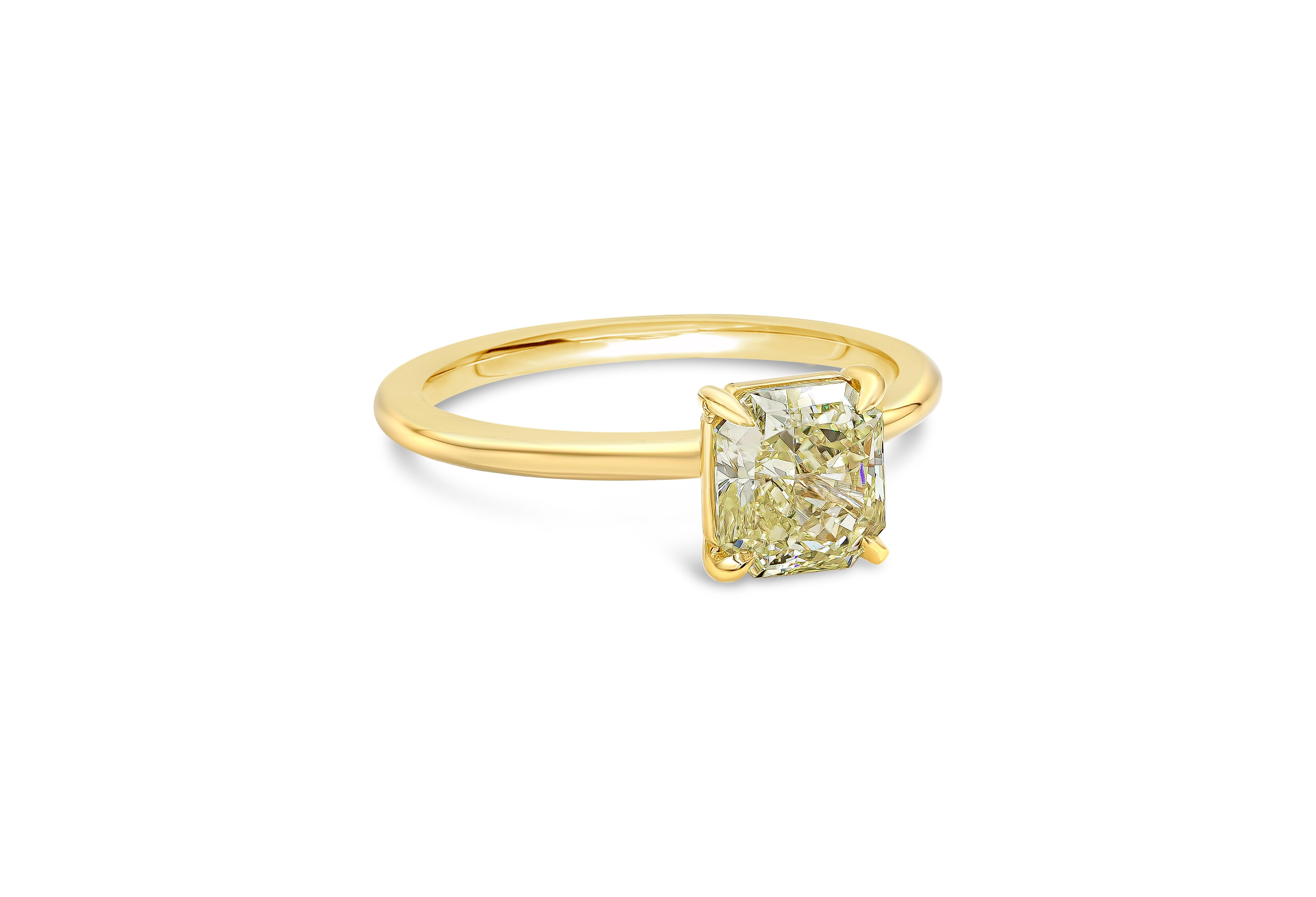 A timeless solitaire engagement ring, featuring a color-rich 1.35 carat radiant cut yellow diamond certified by GIA as Fancy Intense Yellow color and VS2 clarity. Set in a thin polished 18K yellow gold mounting.

Roman Malakov is a custom house,