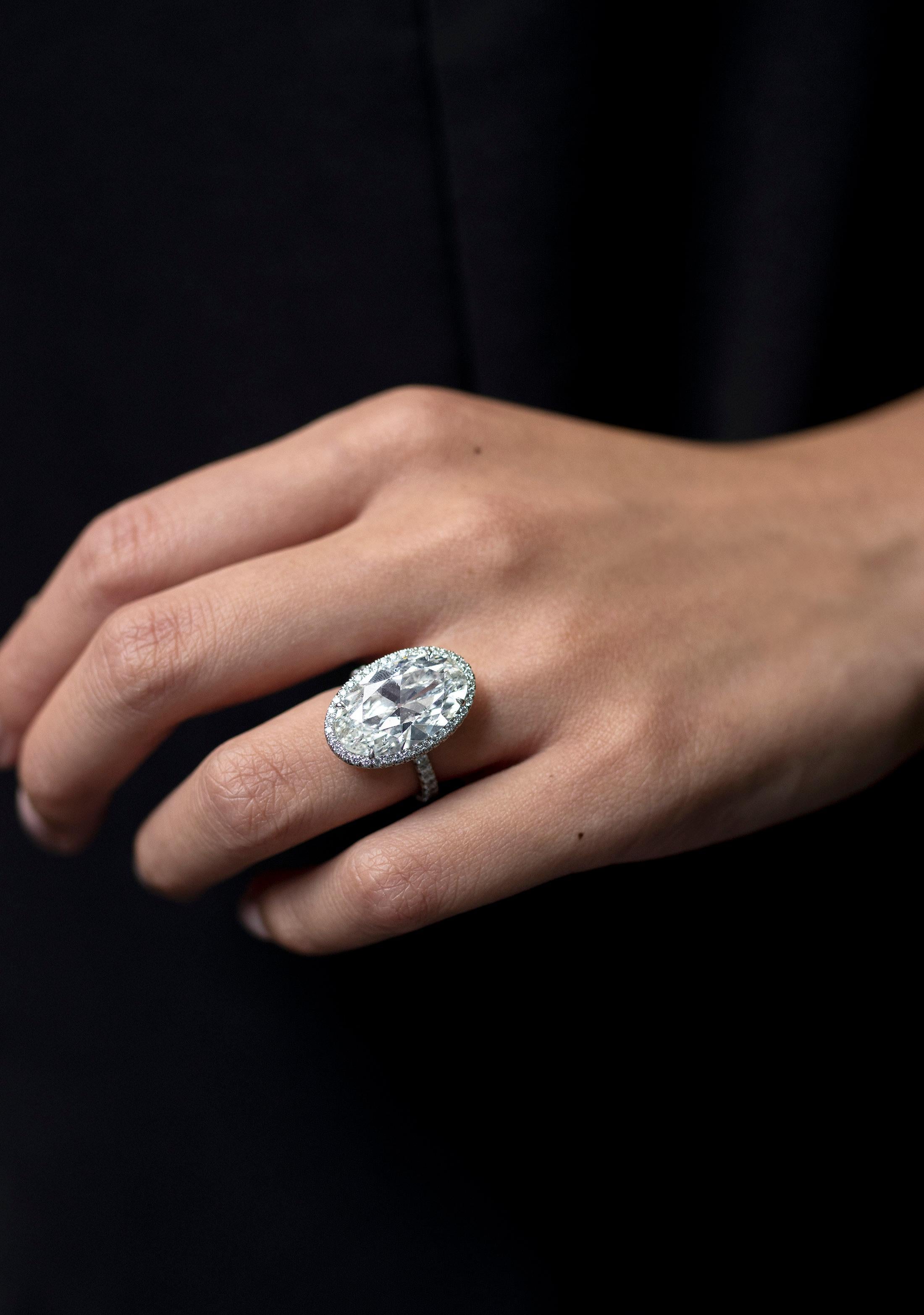 Modern GIA Certified 10.09 Carats Oval Cut Diamond Halo Engagement Ring in Platinum For Sale