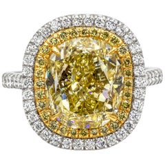 Anello di fidanzamento a doppio anello con diamante giallo taglio ovale certificato GIA da 7.06 carati