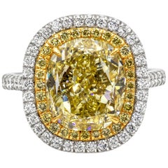 GIA Certified 7.06 Carat Oval Cut Yellow Diamond Double Halo Engagement Ring