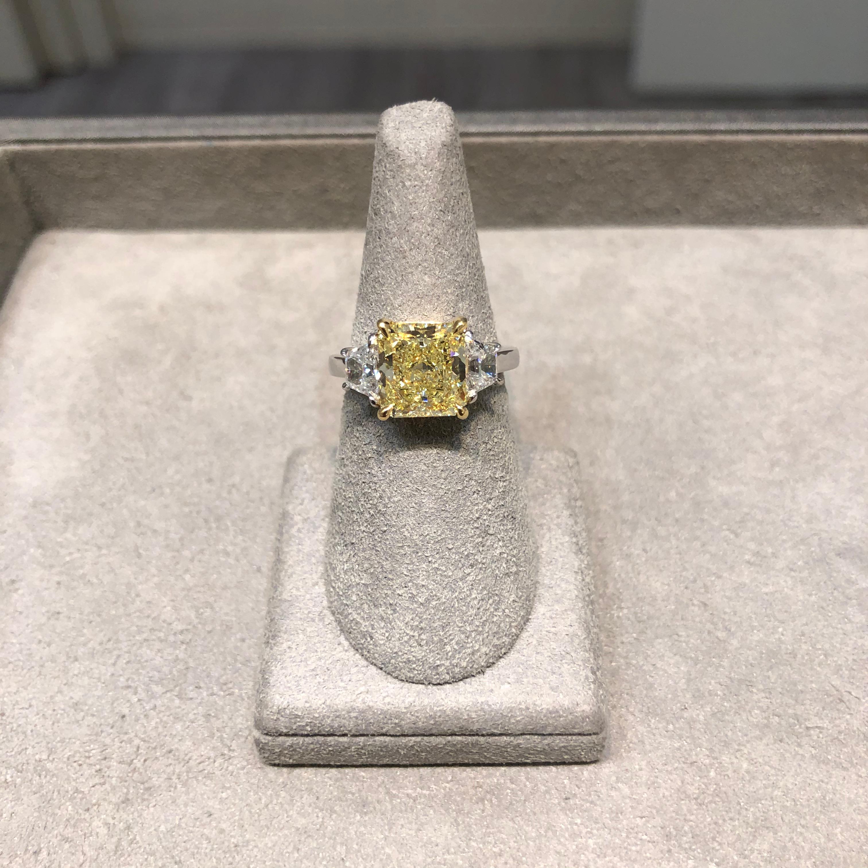 Contemporary GIA Certified Radiant Cut Fancy Yellow Diamond Three-Stone Engagement Ring For Sale