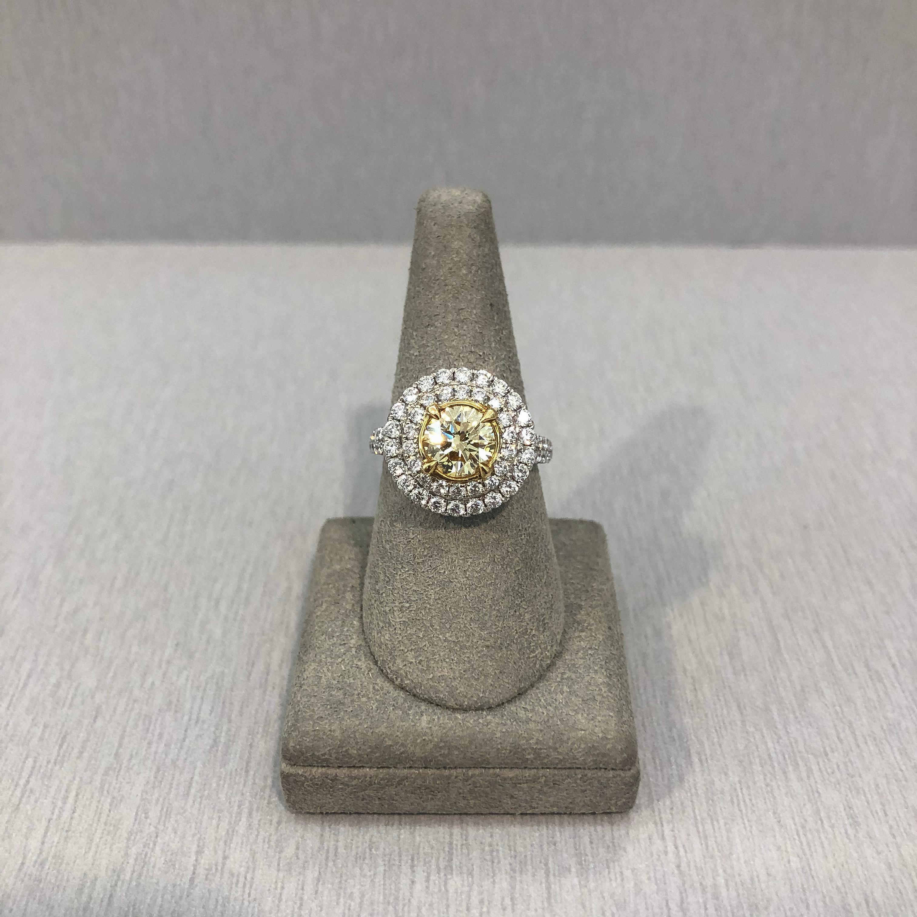GIA Certified 1.41 Carats Fancy Light Yellow Diamond Double Halo Engagement Ring In New Condition In New York, NY