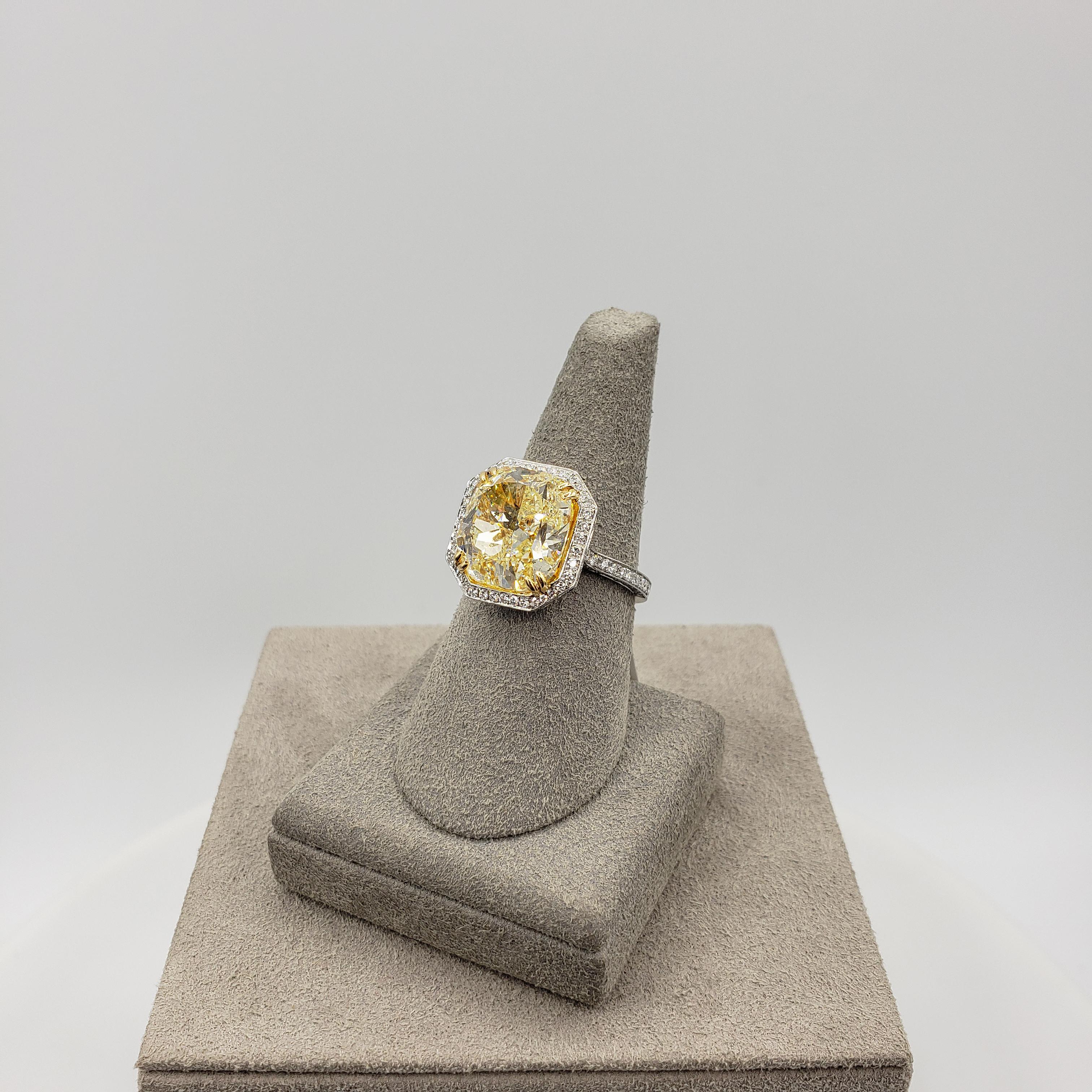 GIA Certified 7.64 Carat Cushion Cut Fancy Yellow Diamond Halo Engagement Ring In New Condition For Sale In New York, NY