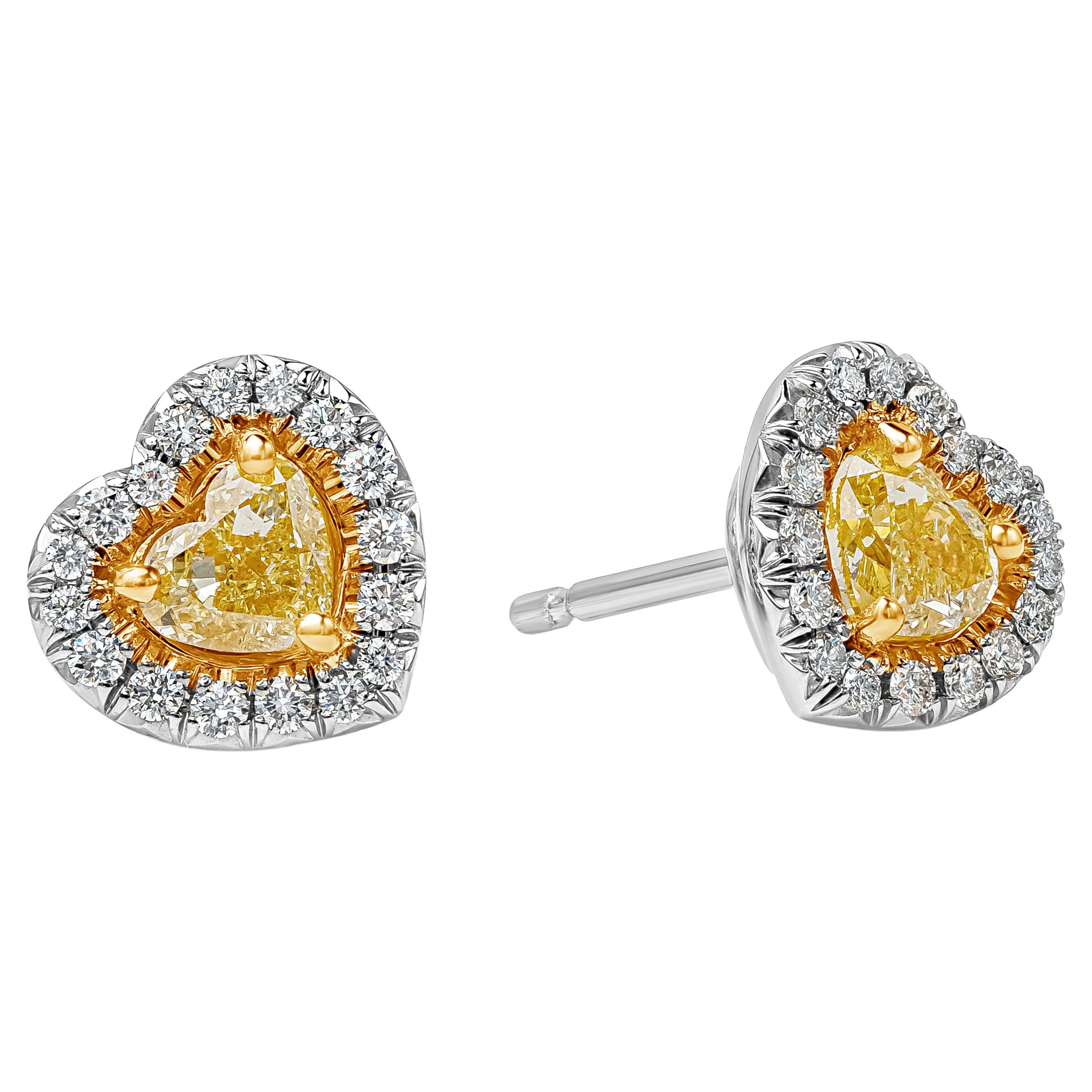 Roman Malakov 0.69 Carats Total Heart Shape Fancy Yellow Diamond Stud Earrings For Sale