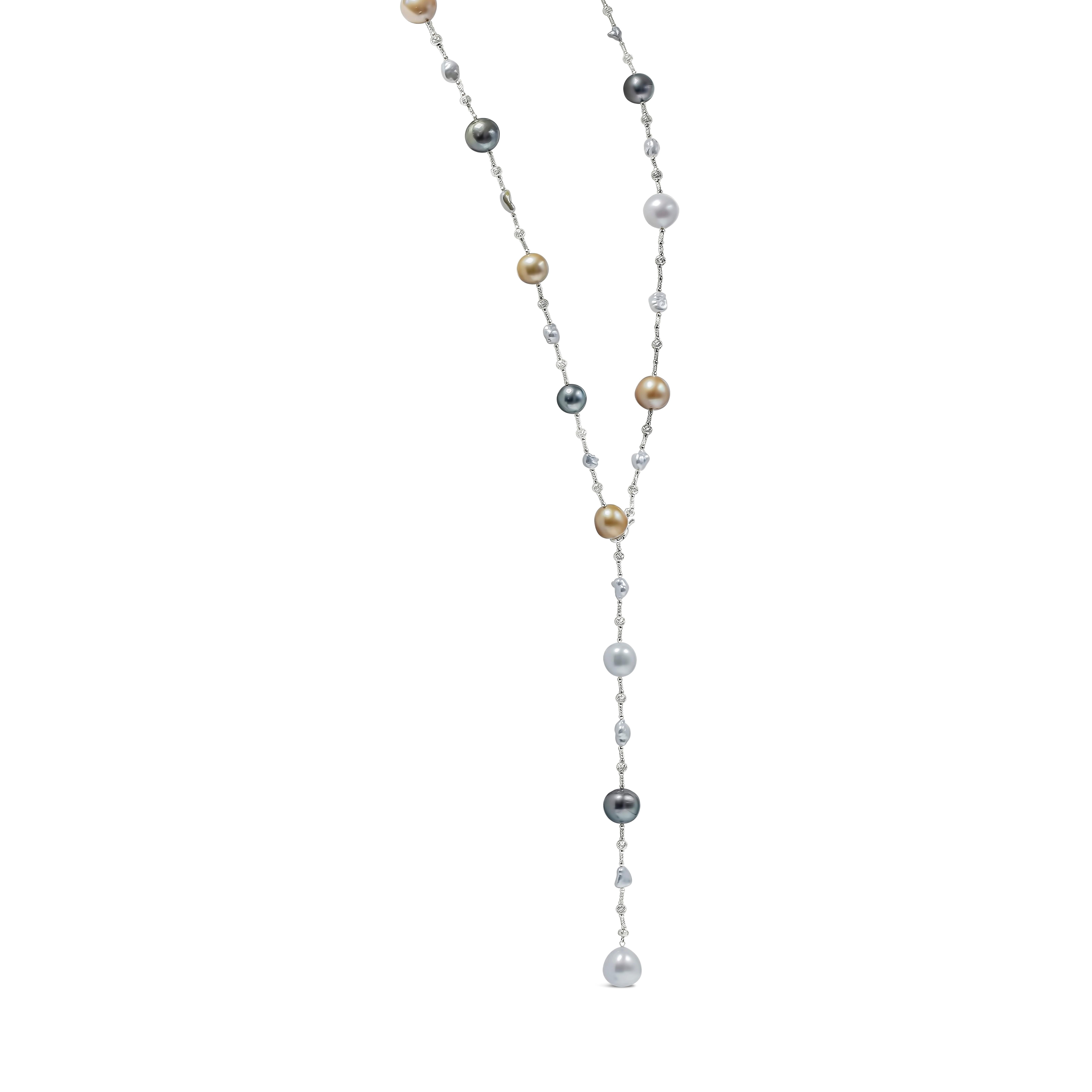 A very versatile necklace showcasing 11-14mm, 30 pieces of multi-color South Sea, Tahitian, and Keshi Pearls. Evenly spaced by 18k white gold knots. 32 inches in length and length of this necklace can be customizable. Finely made in 18K white