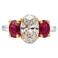 Roman Malakov, Oval Cut Diamond and Ruby Three-Stone Engagement Ring