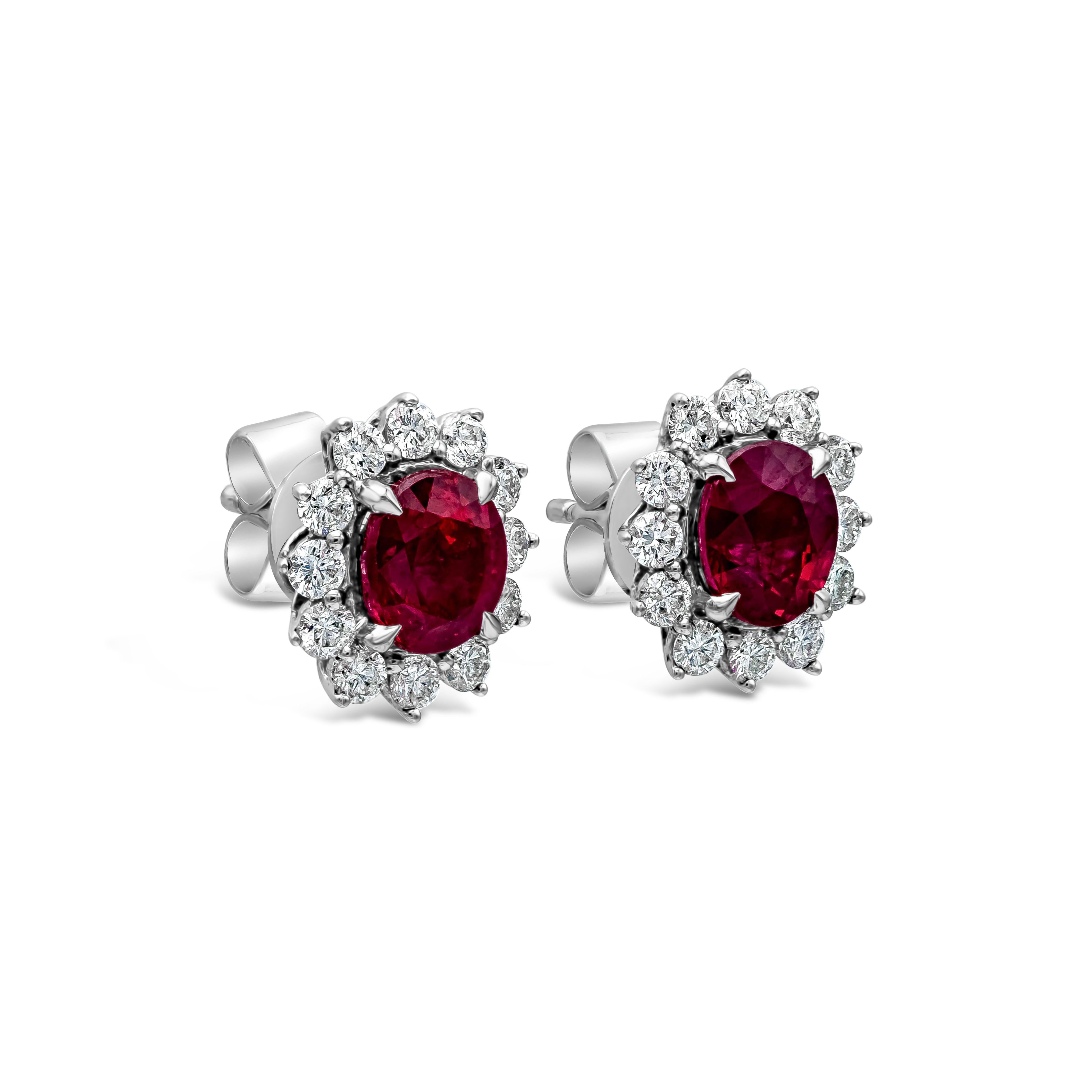 Contemporary Roman Malakov 2.09 Carat Oval Cut Ruby And Diamond Halo Stud Earrings For Sale