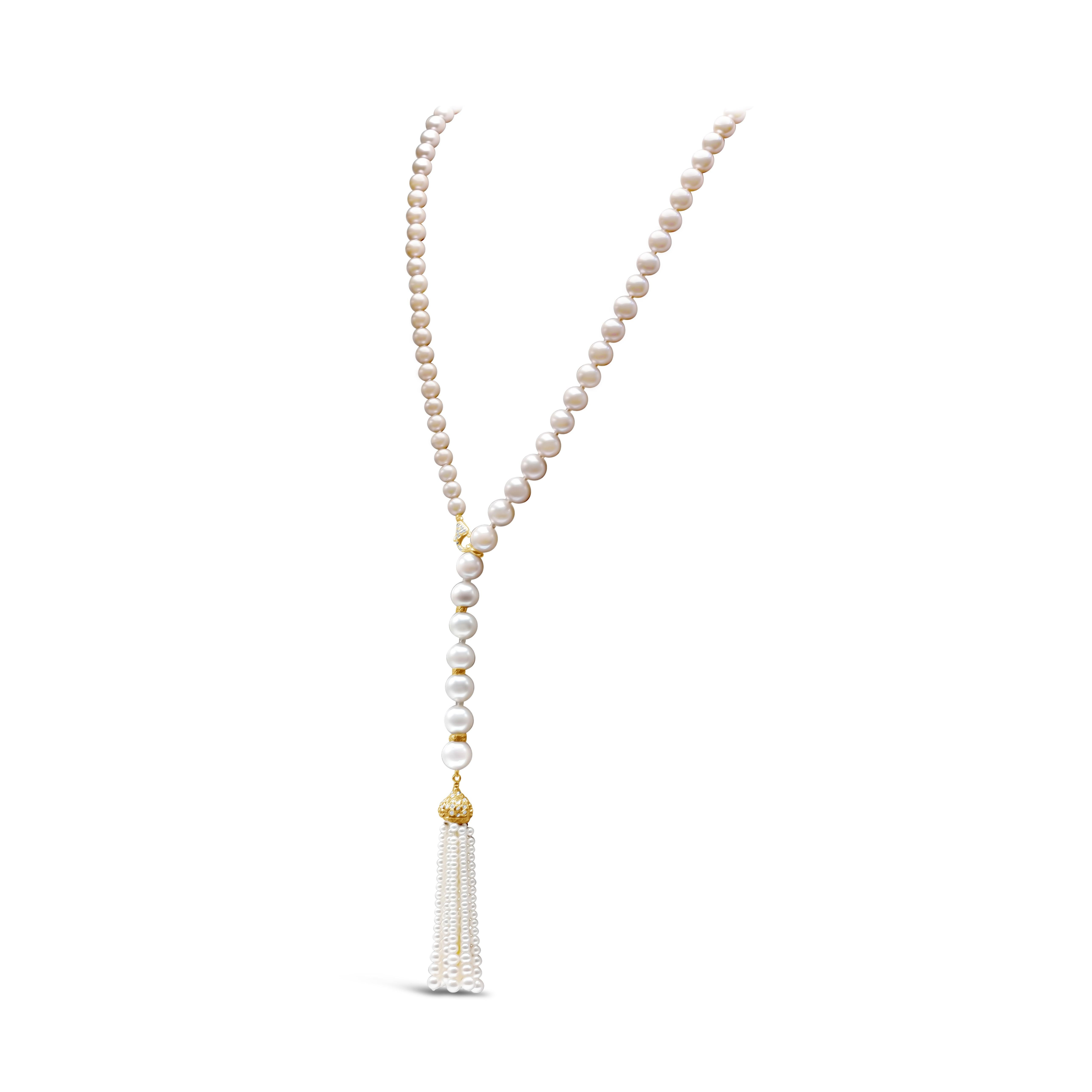 A beautiful tassel necklace featuring 7.8-13 mm pink and white south sea pearls. It has 83 pieces of south sea pearls with a tassel drop that is 7.5 inches long and designed in a classic opera length style. Length of this necklace can be