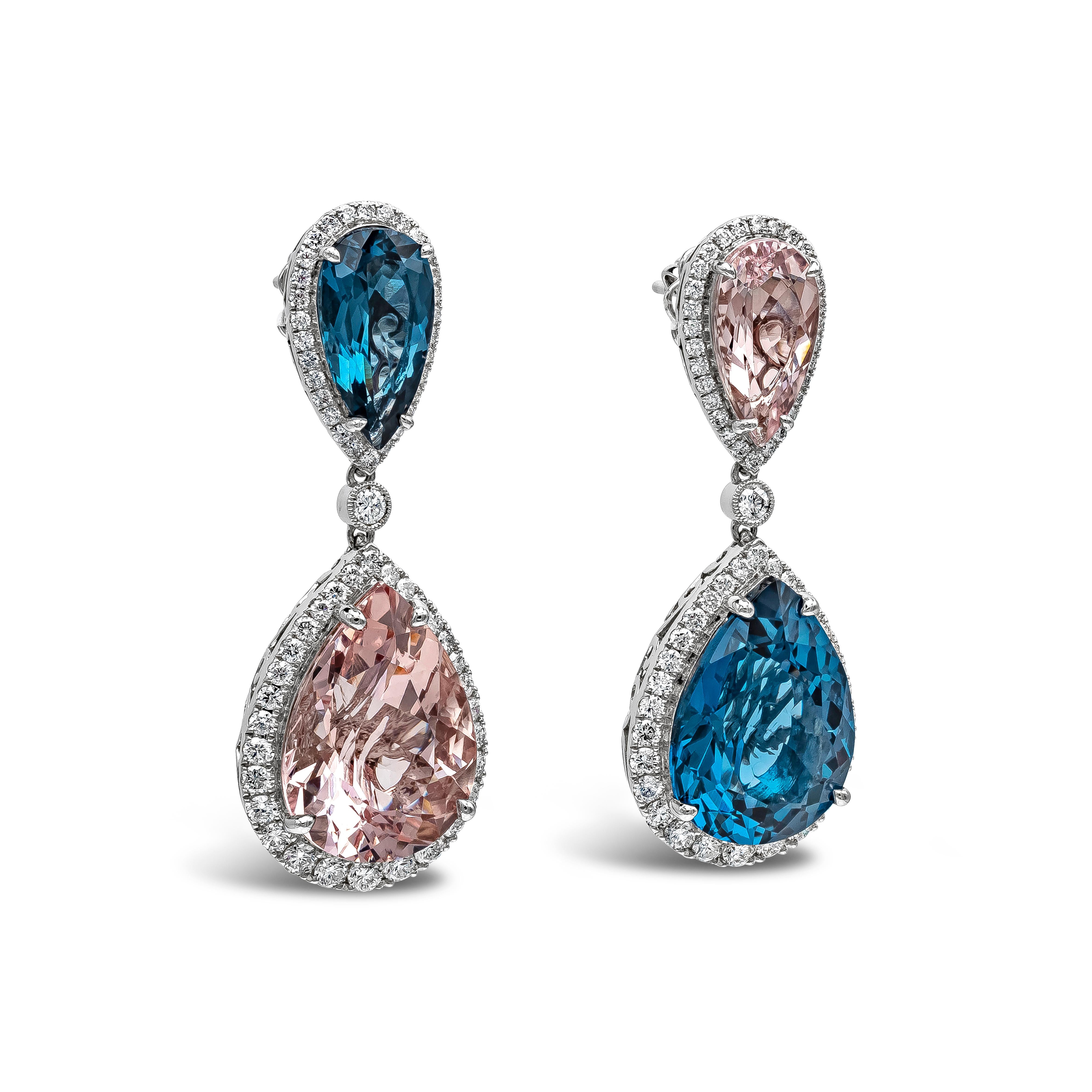 Ein wunderschönes und farbenfrohes Paar Ohrhänger mit einer Kombination aus einem birnenförmigen rosa Morganit und einem Londoner Topas, eingefasst in eine Brillantfassung. Morganite wiegen insgesamt 10,68 Karat; Blautopase wiegen insgesamt 14,48