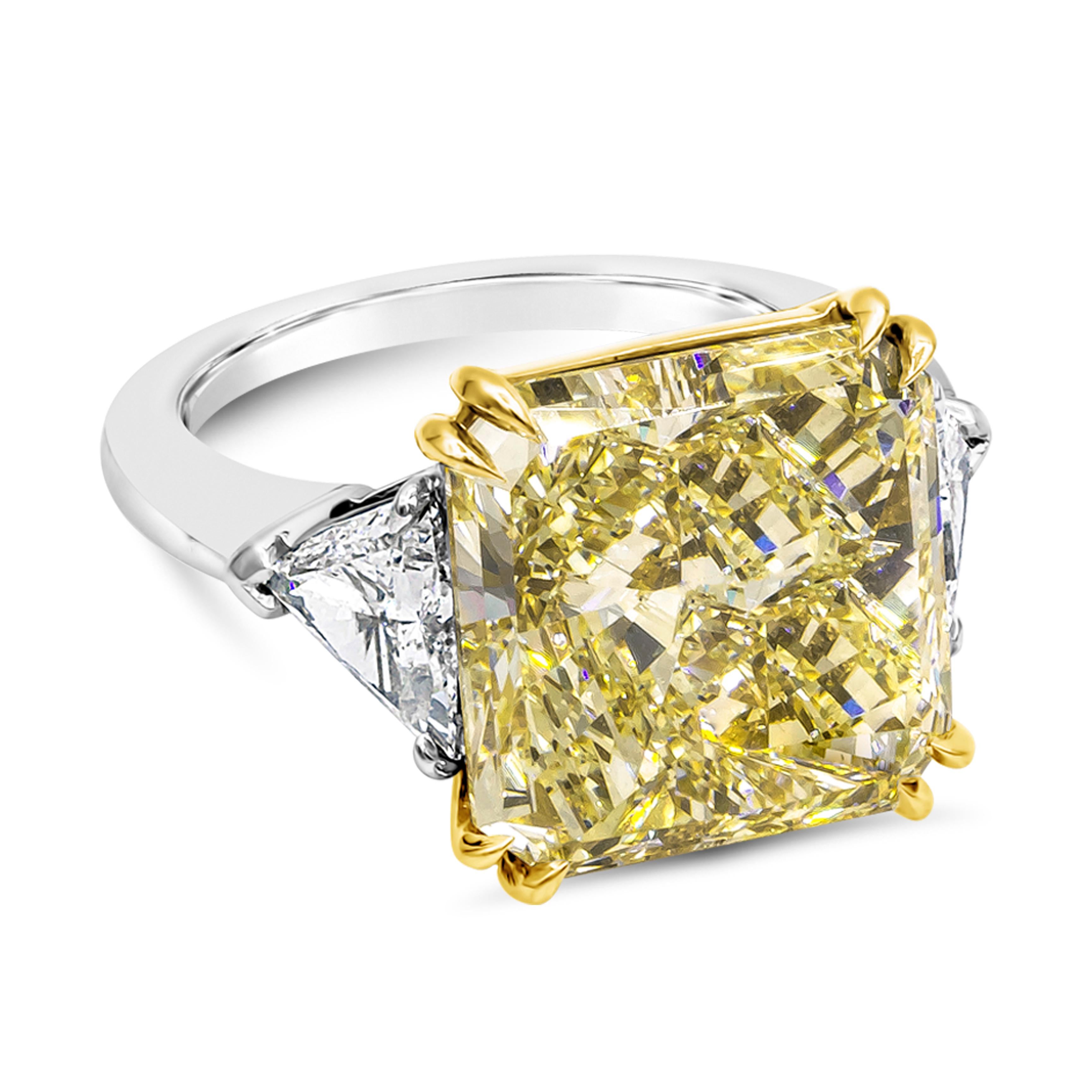 Well crafted high end engagement ring showcasing a GIA certified color-rich fancy yellow color 10.59 carat radiant cut diamond, VS1 in clarity. Accented with trillion diamonds on each side weighing 1.16 carat total and is set and finely made in