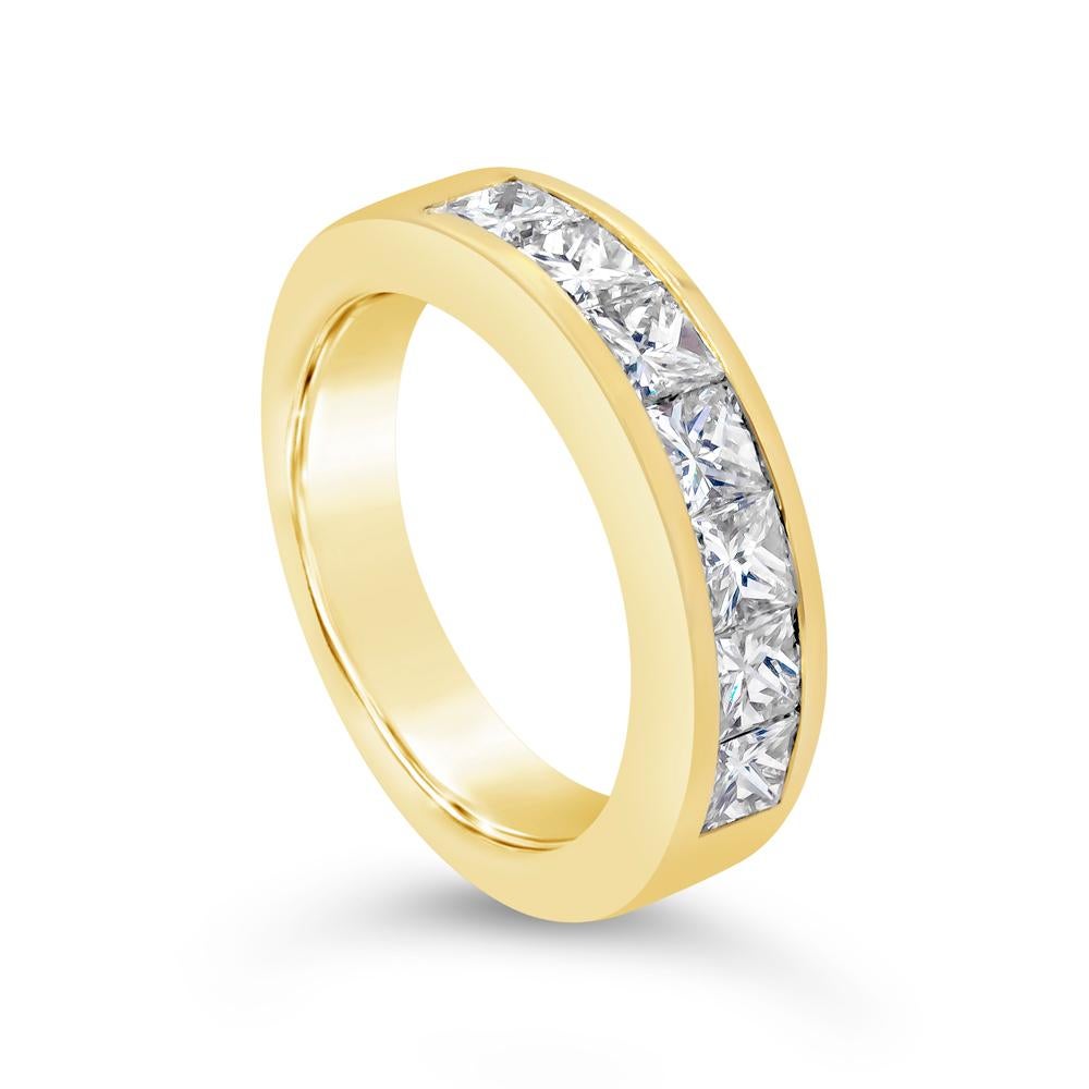 This classic wedding band style showcases seven princess cut diamonds weighing 1.45 carats total. Mounted in a channel setting made in 14K Yellow Gold. Size 5.75 US and resizable upon request.

Roman Malakov is a custom house, specializing in