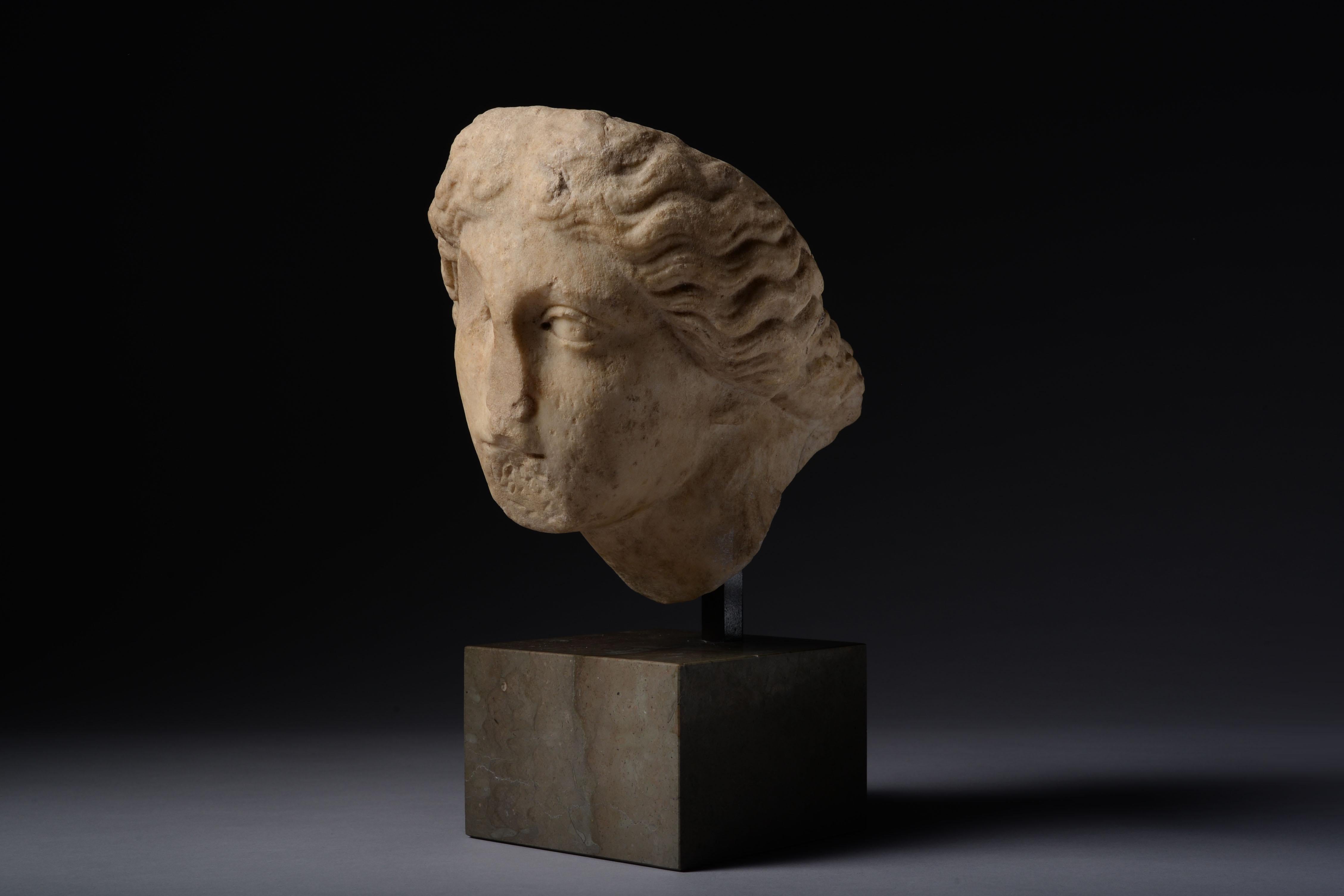 marble head and torso of athena