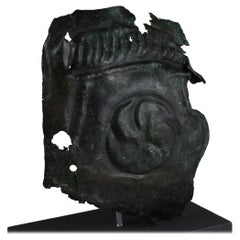 Antique Roman military cheek piece of a helmet fragment with shield ornament