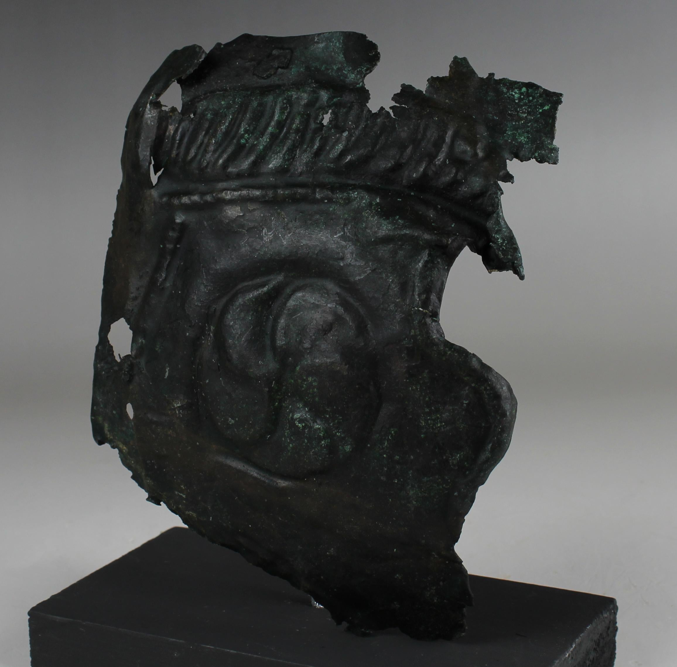 Italian Roman military cheek piece of a helmet fragment with shield ornament