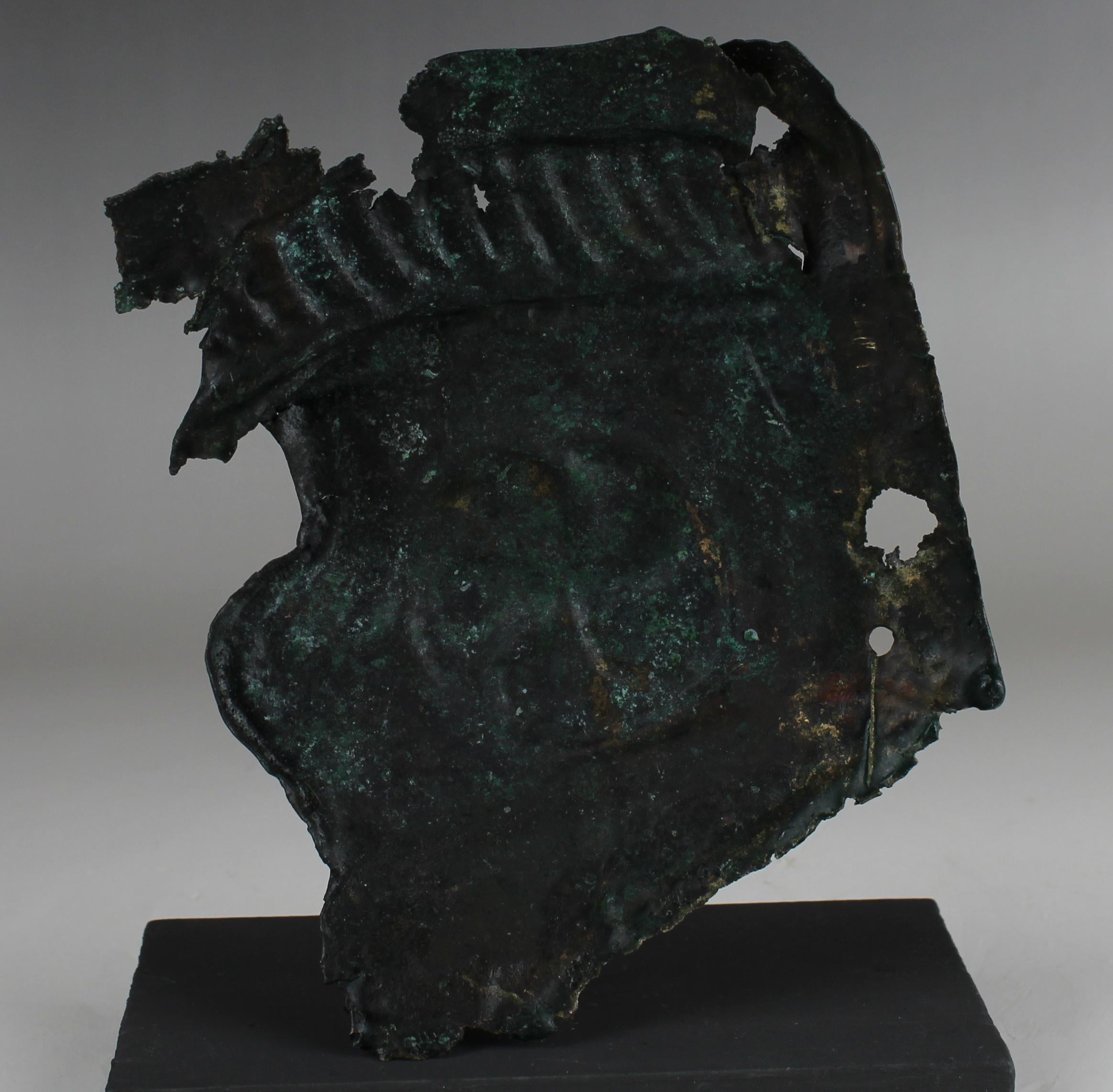 Roman military cheek piece of a helmet fragment with shield ornament In Good Condition In EL CAMPELLO, ES