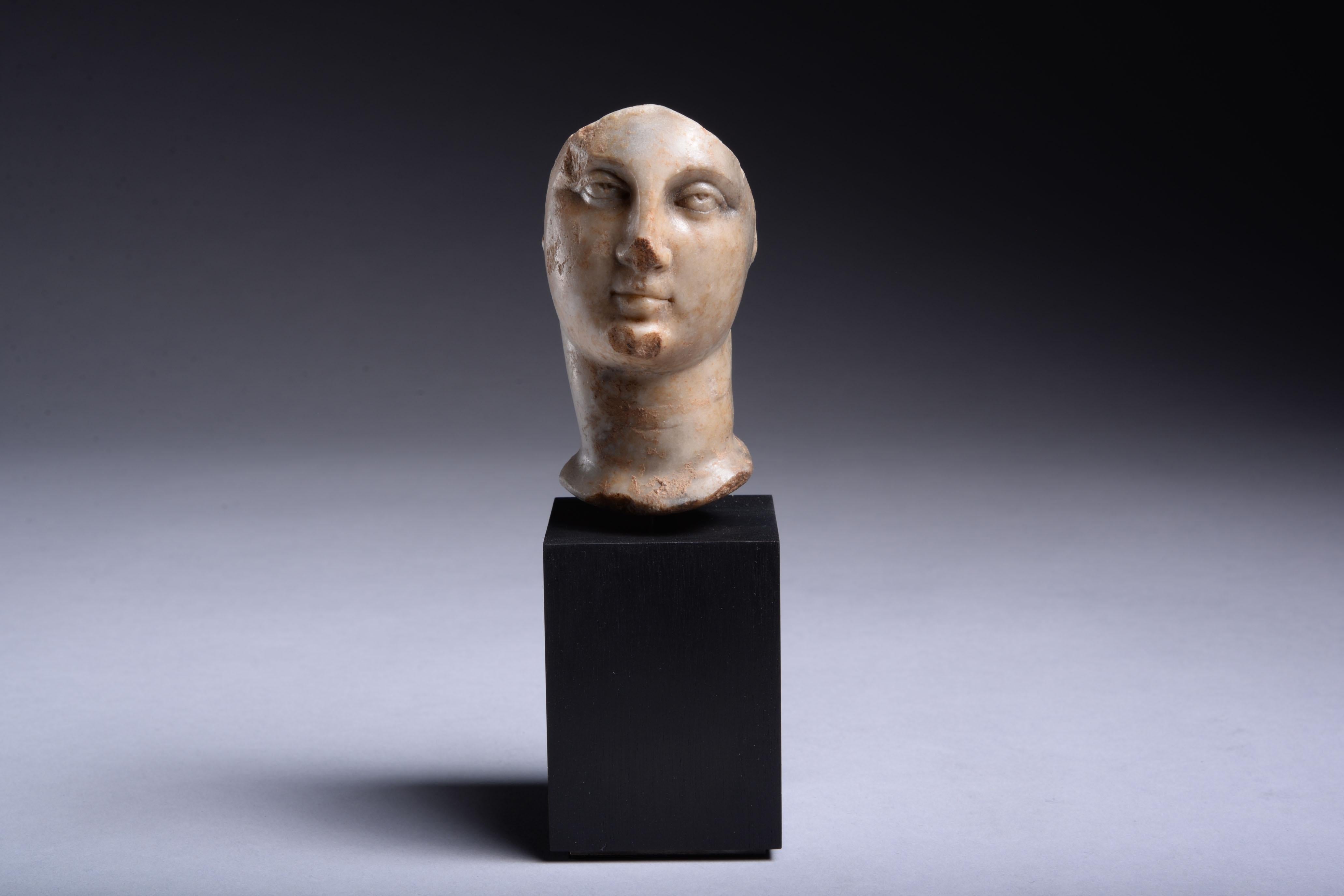 Hand-Carved Roman Portrait Bust of a Noble Woman For Sale