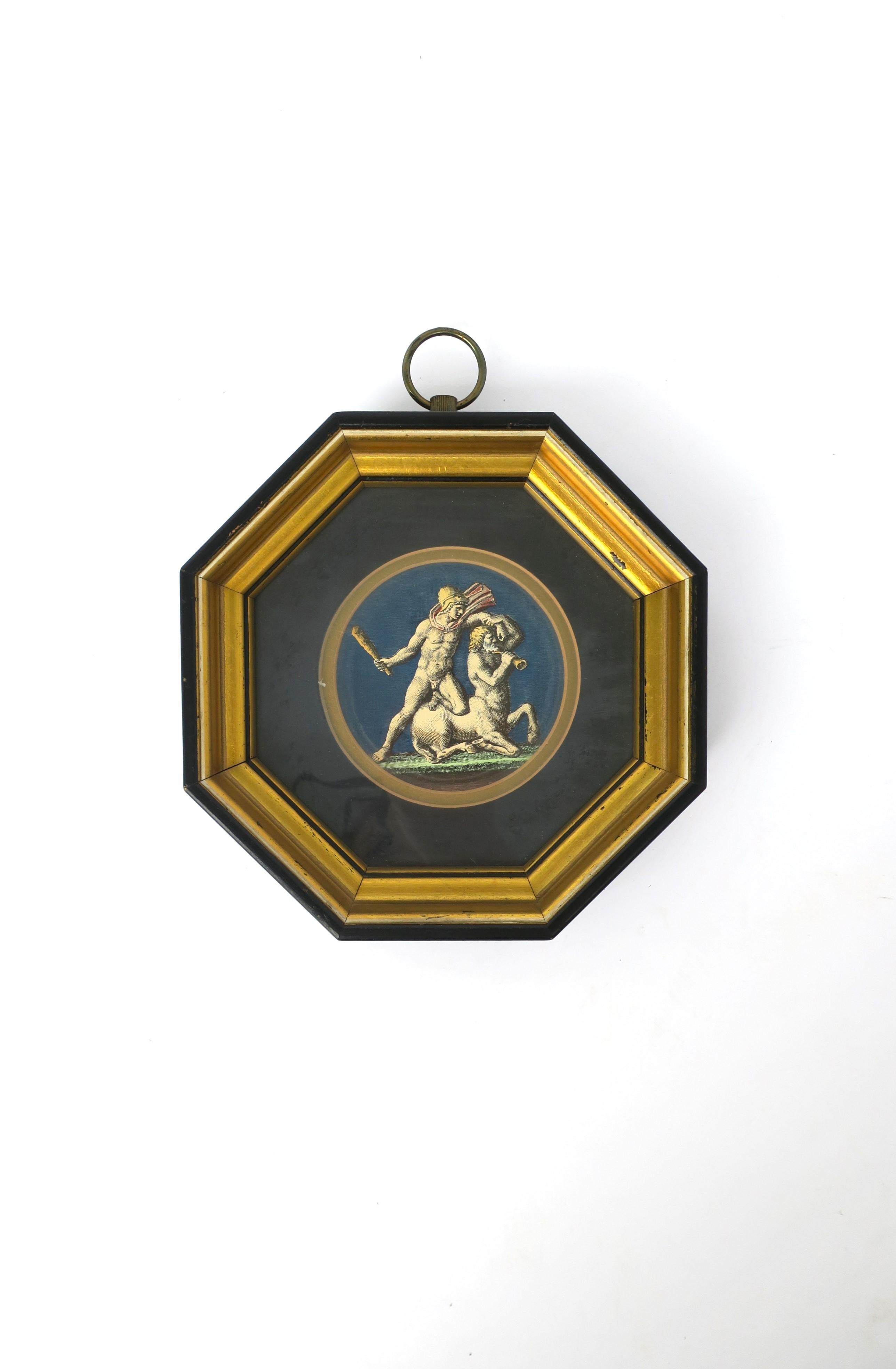 A beautifully made Roman or Greek medieval framed wall art scene, circa mid-20th century, Europe. Scene depicts a muscular man and a centaur (half man half horse.) Wall art piece has a dark blue and gold octagonal wood frame, matting, protective