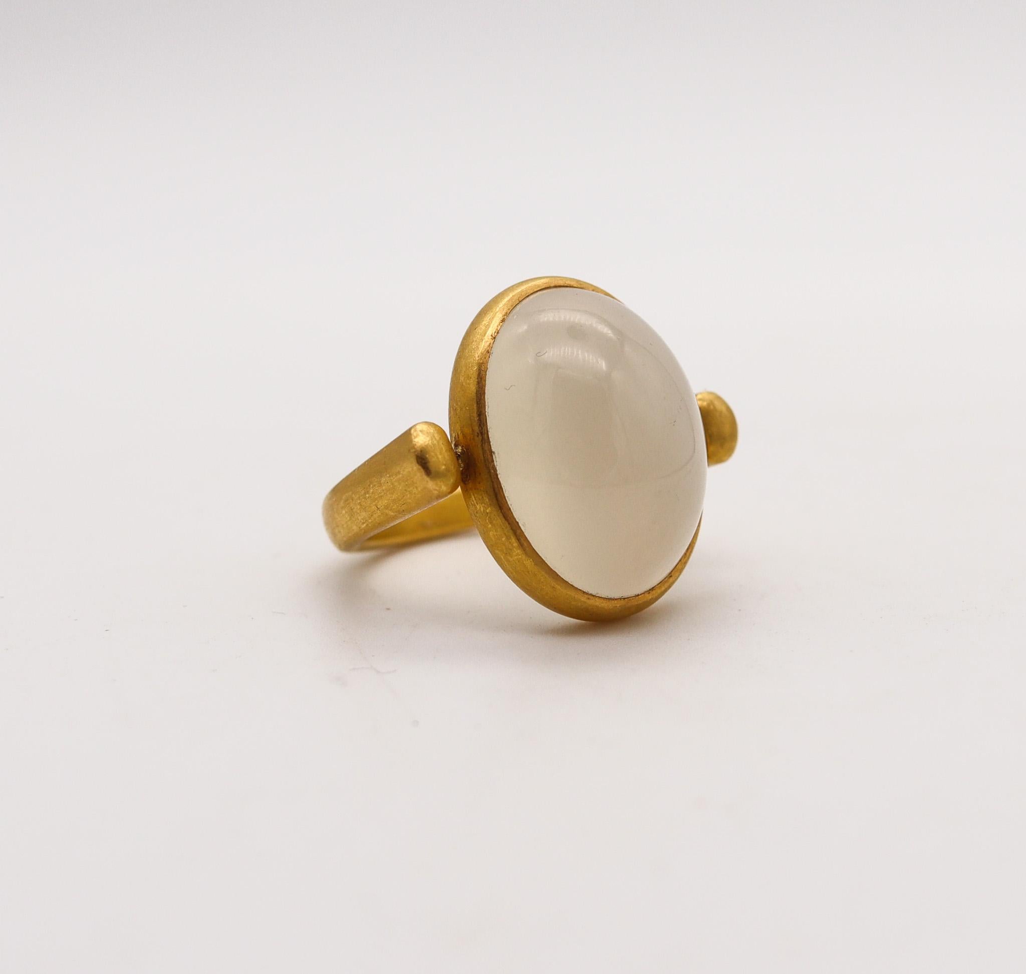 Roman revival style signet ring with moonstone.

A statement signet ring, crafted in solid yellow gold of 18 karats with brushed finish. The ring has been designed in Italy in the ancient Roman style, with a swivel to flip the main gemstone. Mount