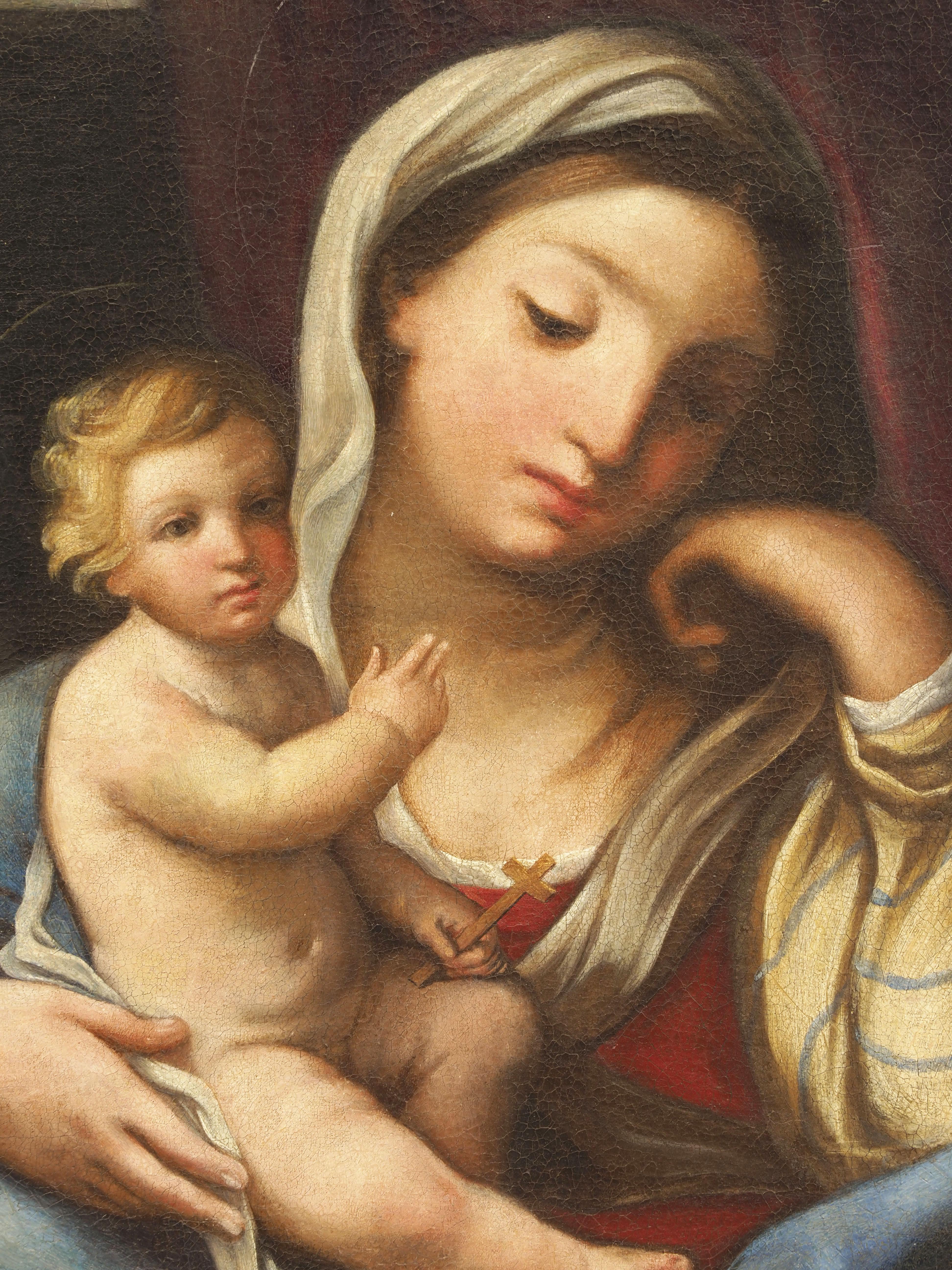 Römische Schule der italienischen Malerei Madonna mit Kind frühes XVIII Jahrhundert
Dieses außergewöhnlich gut erhaltene Kunstwerk wurde von einem Künstler der römischen Schule der italienischen Malerei im frühen XVIII. Jahrhundert geschaffen und