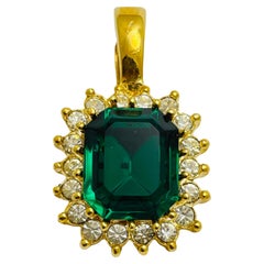 collar de diseño con colgante de cristal verde esmeralda y oro bicolor firmado por ROMAN