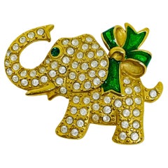 ROMAN signed vintage gold tone rhinestones enamel elephant bow designer brooch