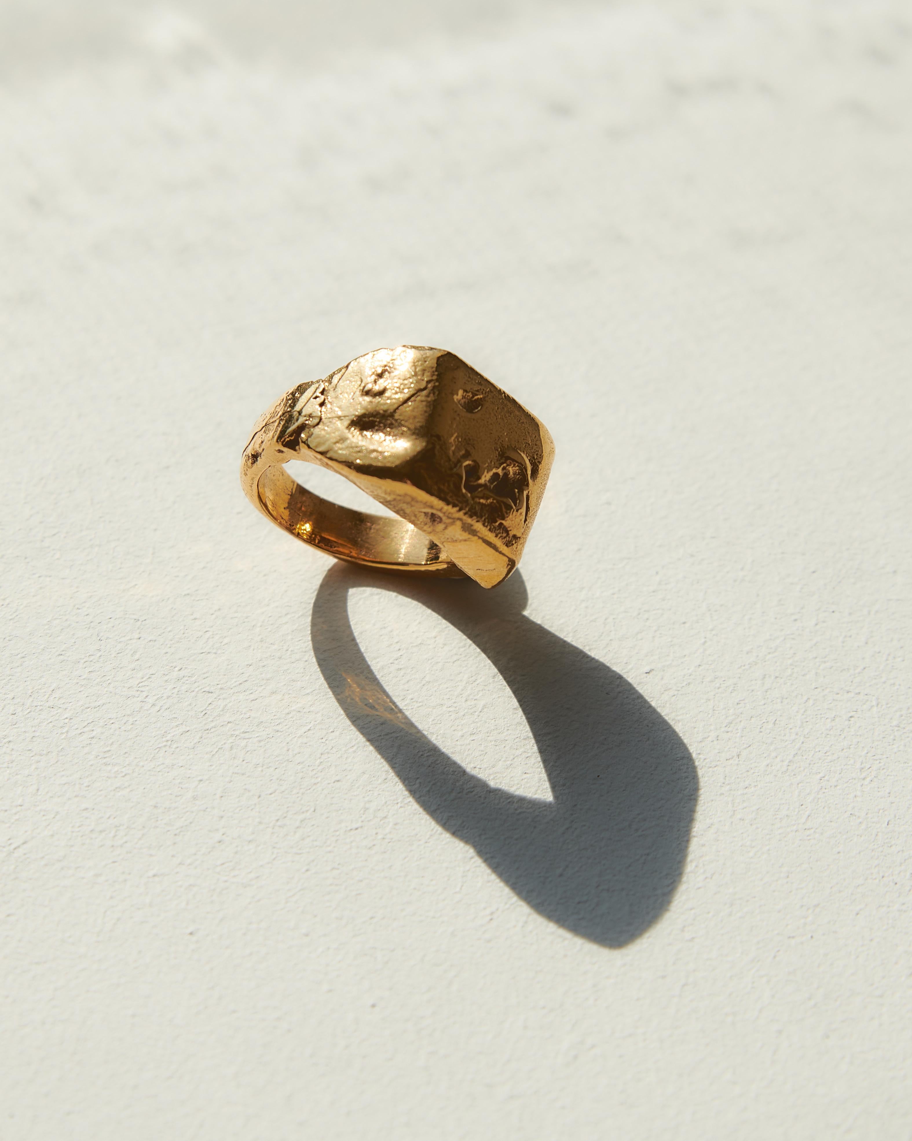 Roman Signet Ring is handmade of 24ct gold-plated bronze.

A signet ring is a small seal, carved into and worn as a ring. Often signet rings contain the owner’s initials, or a symbol unique to the individual. In centuries past, they were worn as a