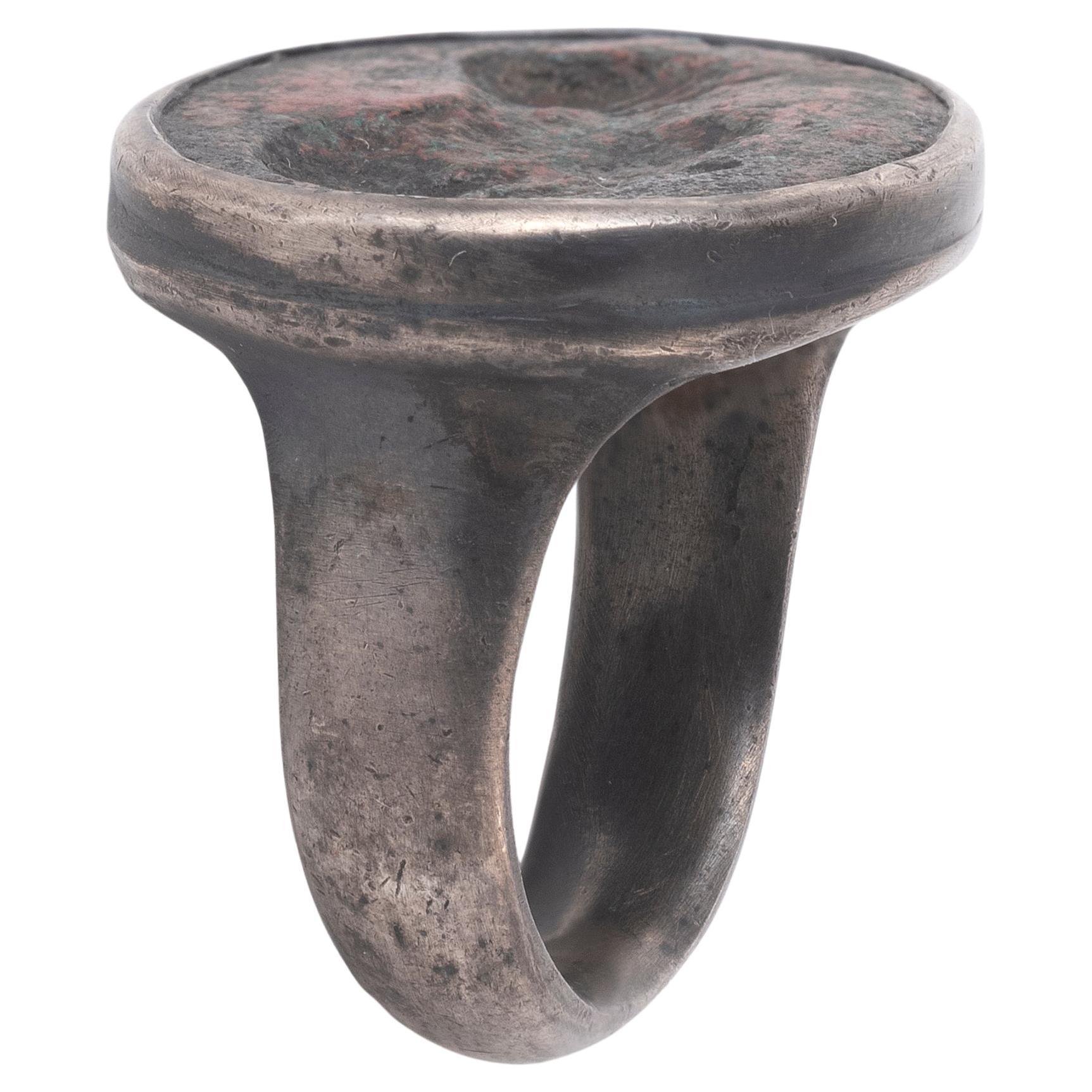 Roman Silver Signet Ring with profile portrait on bronze  1st-3rd century AD
Top size 25mm
Size: 7 3/4
Weight 18,58gr.