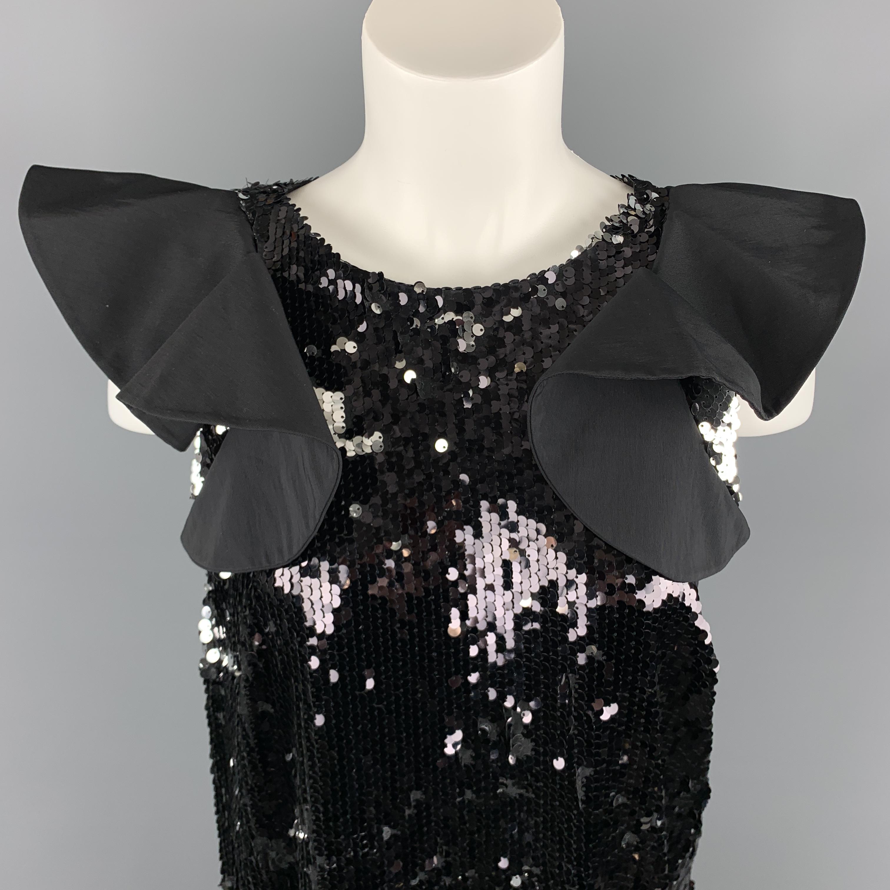 ROMAN cocktail dress comes in black and silver reverse sequin fabric with ruffled shoulders and an A line silhouette. 

Excellent Pre-Owned Condition.
Marked: 8

Measurements:

Shoulder: 18 in.
Bust: 42 in.
Waist: 42 in.
Hip: 46 in.
Length: 35 in.