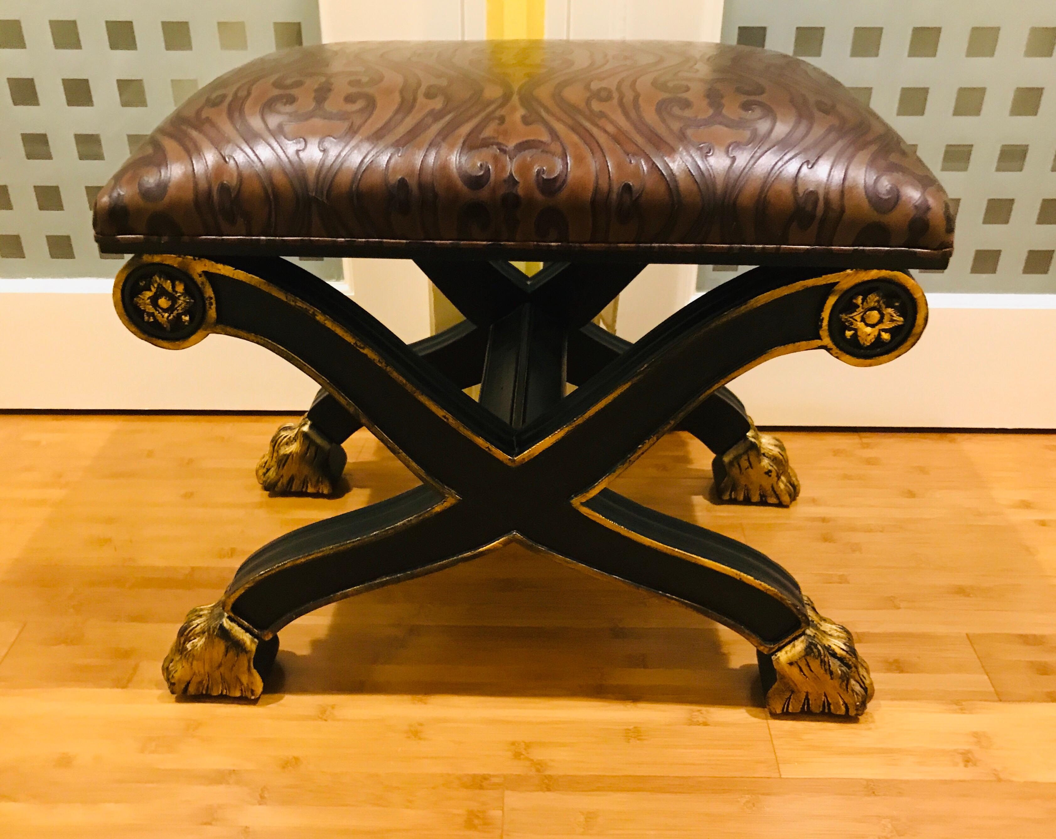 Roman Style Curule Ottoman Gilt Paw Feet Embossed Leather Upholstery In Good Condition For Sale In West Palm Beach, FL
