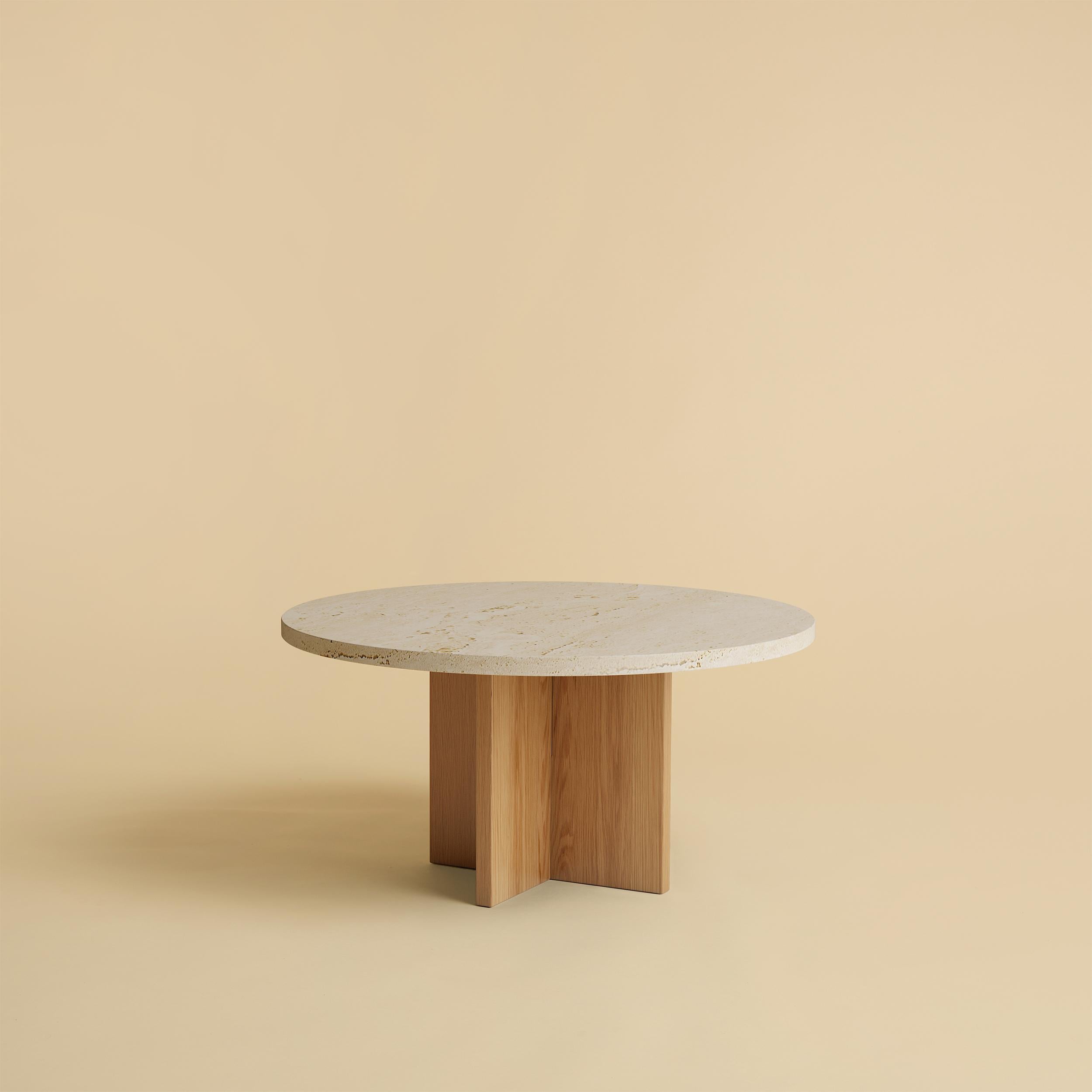 Roman Travertine and Oak Tinian Coffee Table by Lebanto
Dimensions: W 60 x D 60 x H 31 cm
Materials: Marble, Wood.

Lebanto is an expression of identity, a tapestry of dreams woven from the threads of their lives. Their journey began with a simple