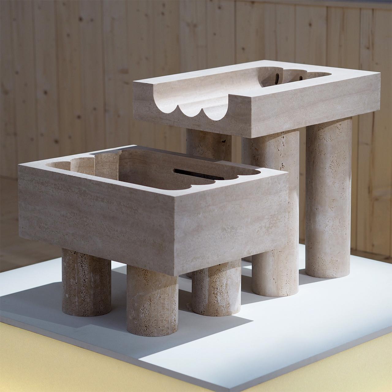 Roman Travertine Monolithic font by Tino Seubert
Dimensions: D 100.5 x W 61 x H 62.1 cm.
Materials: Roman Travertine.

Tino Seubert
When he first made his now signature wicker and aluminium stools and benches in 2018 for a show at the Hepworth