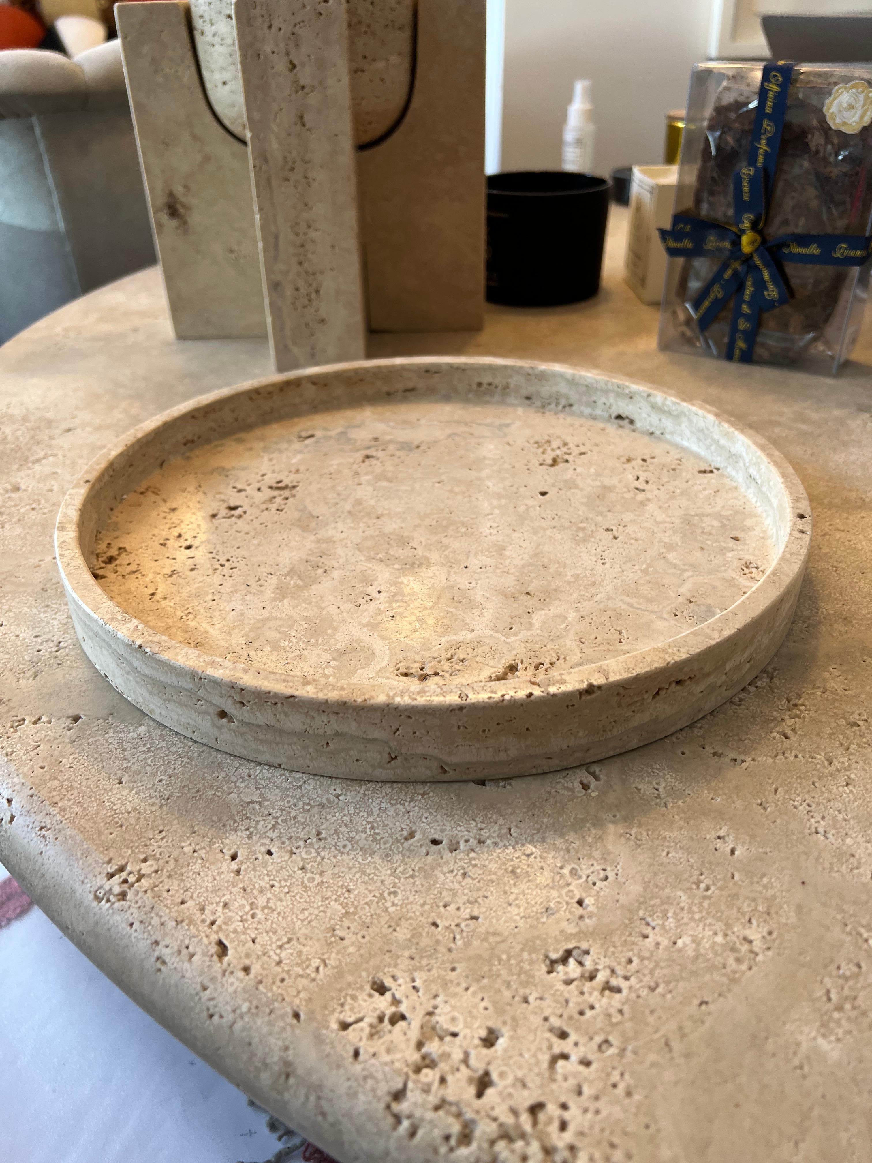 Roman round travertine tray by Le Lampade.
Made in Italy 
This item can be also custom made.
