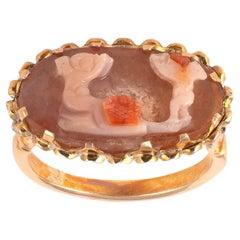 Romanischer Kamee-Ring mit zwei Putten aus rosa Achat, 3.-4. Jahrhundert
