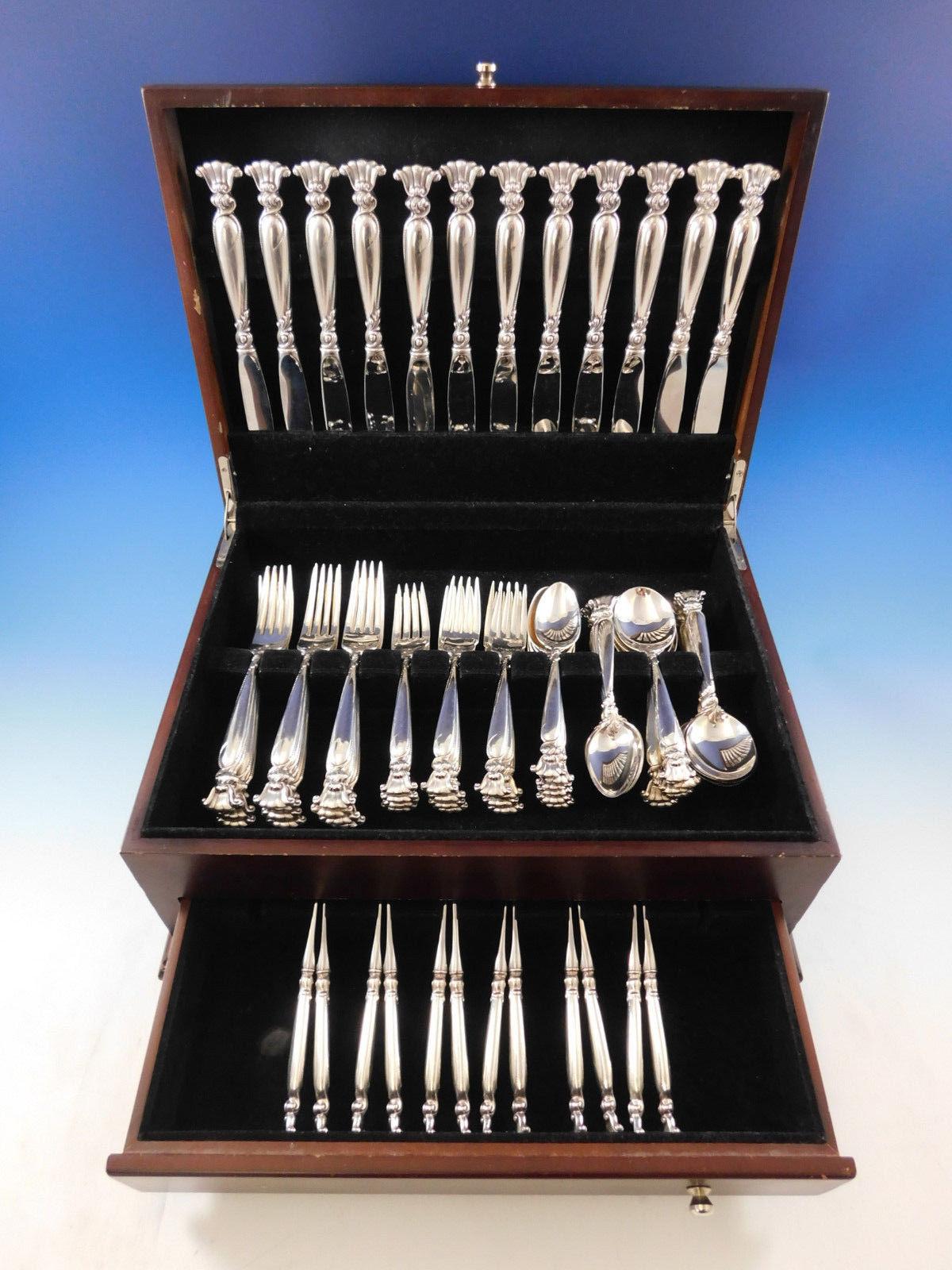 Romance of the sea by Wallace sterling silver flatware set, 72 pieces. This set includes:

12 regular knives, 9 1/8