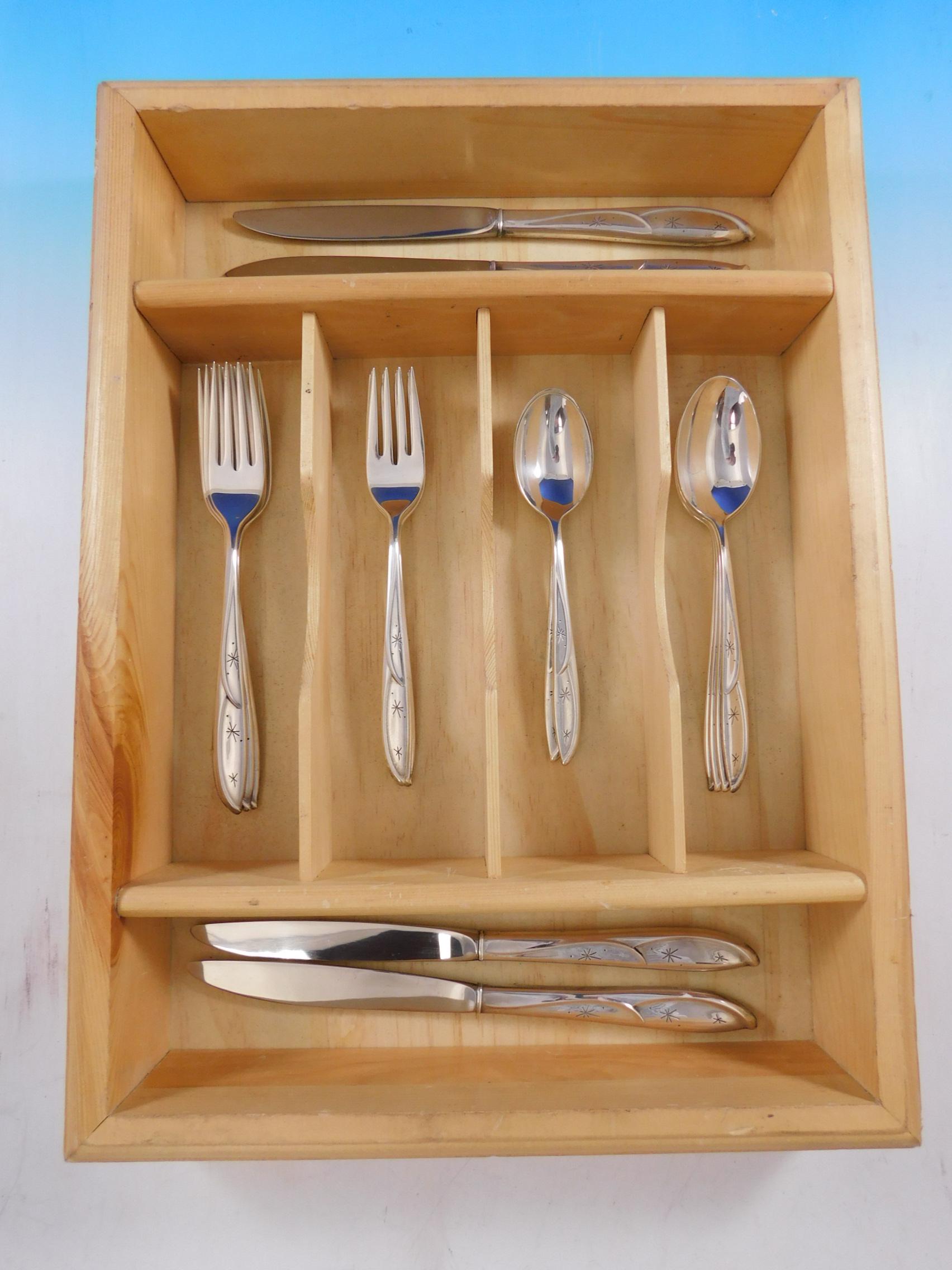 Mid-Century Modern Romance of the Stars by International, circa 1959, sterling silver flatware set - 20 pieces. This set includes:

4 knives, 9 1/8