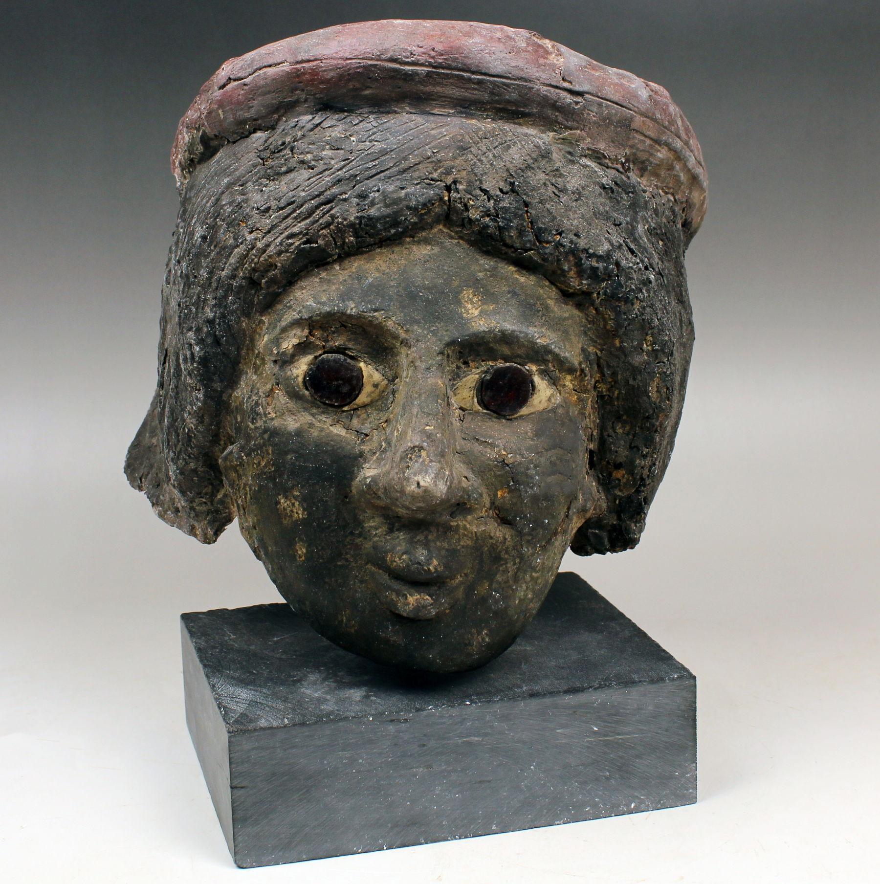 Classical Roman Romano-Egyptian cartonnage mummy mask depicting a female head For Sale