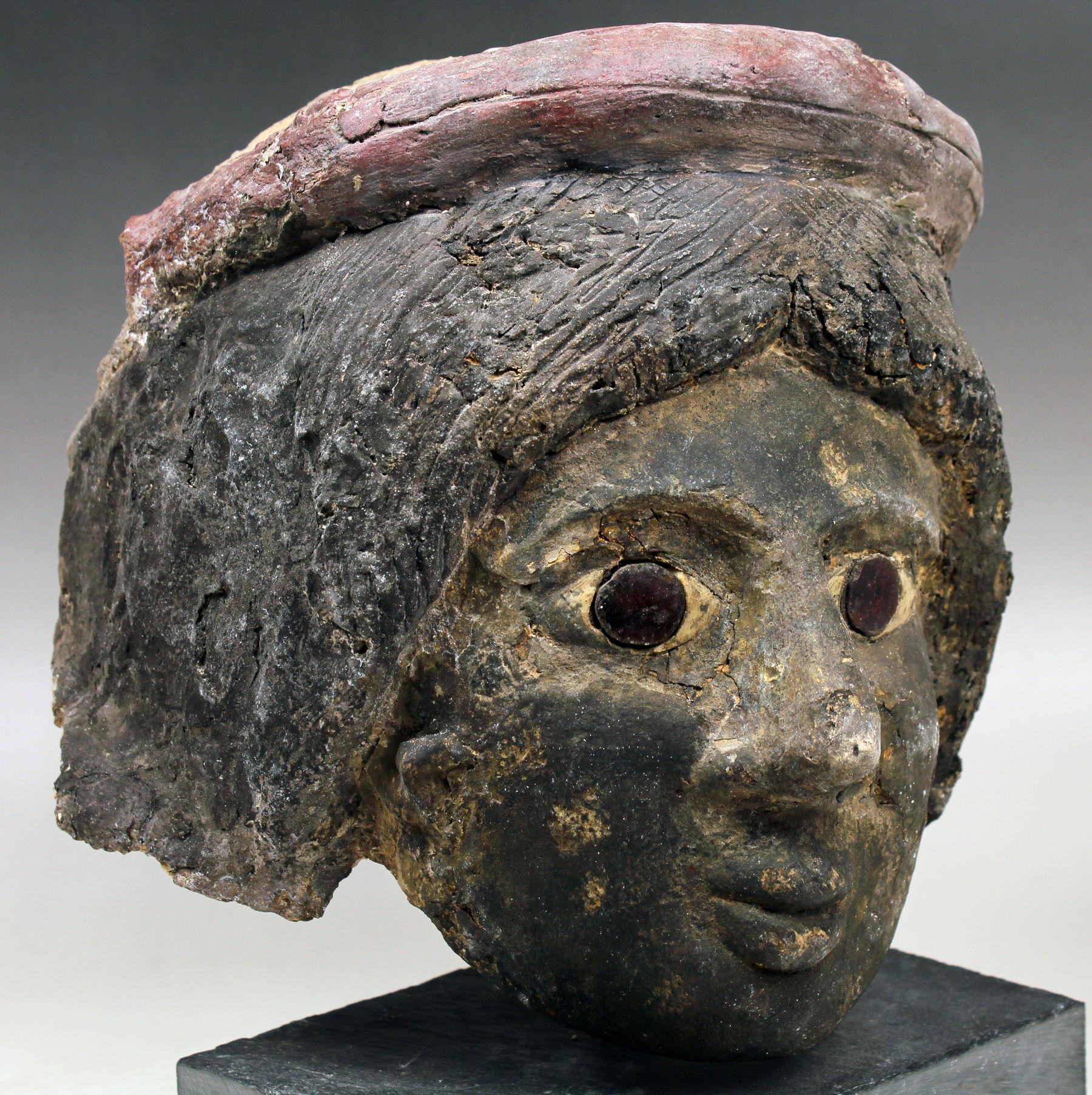 18th Century and Earlier Romano-Egyptian cartonnage mummy mask depicting a female head For Sale